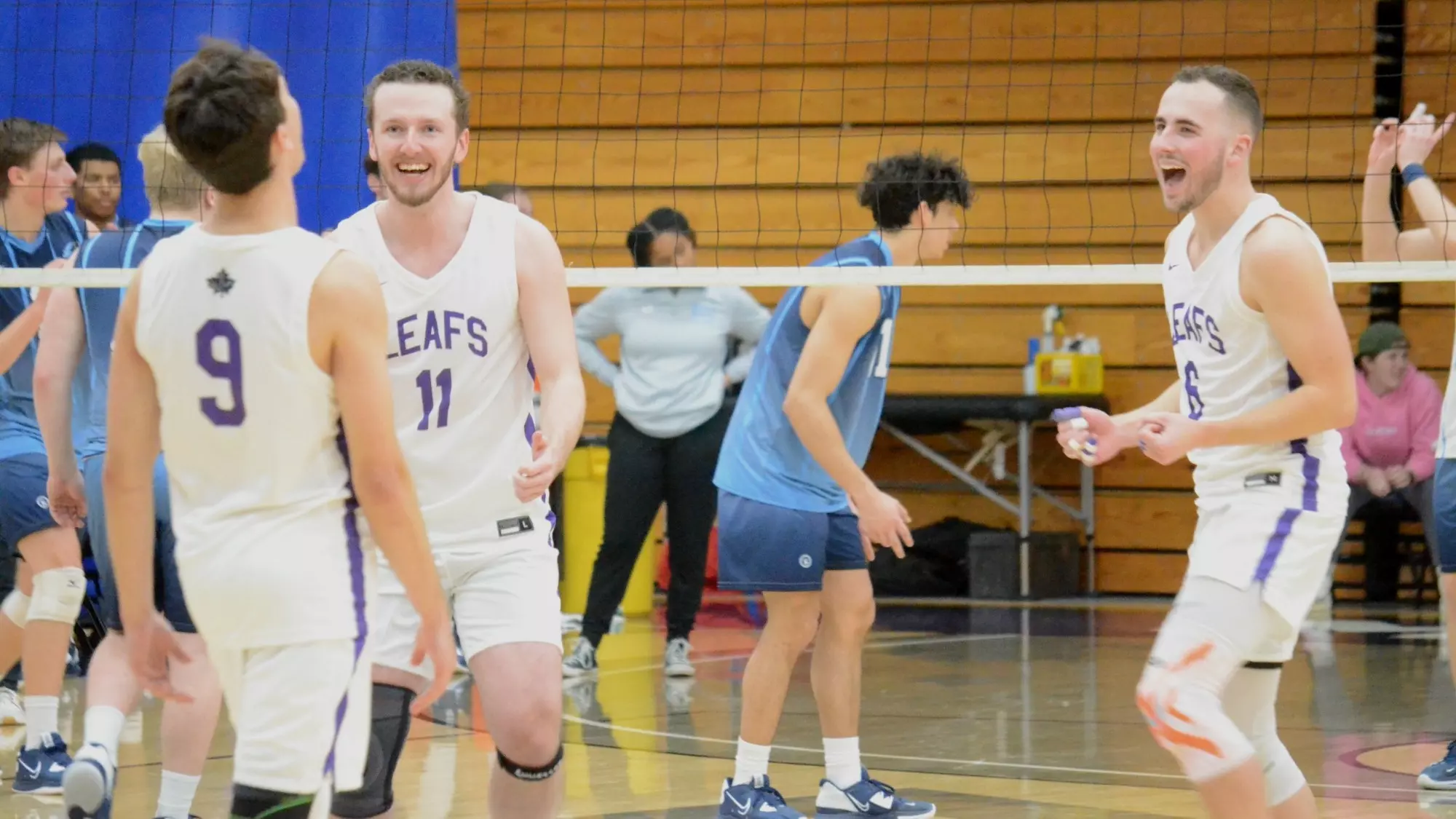 Bollinger, Minetto, and Bennett cheer