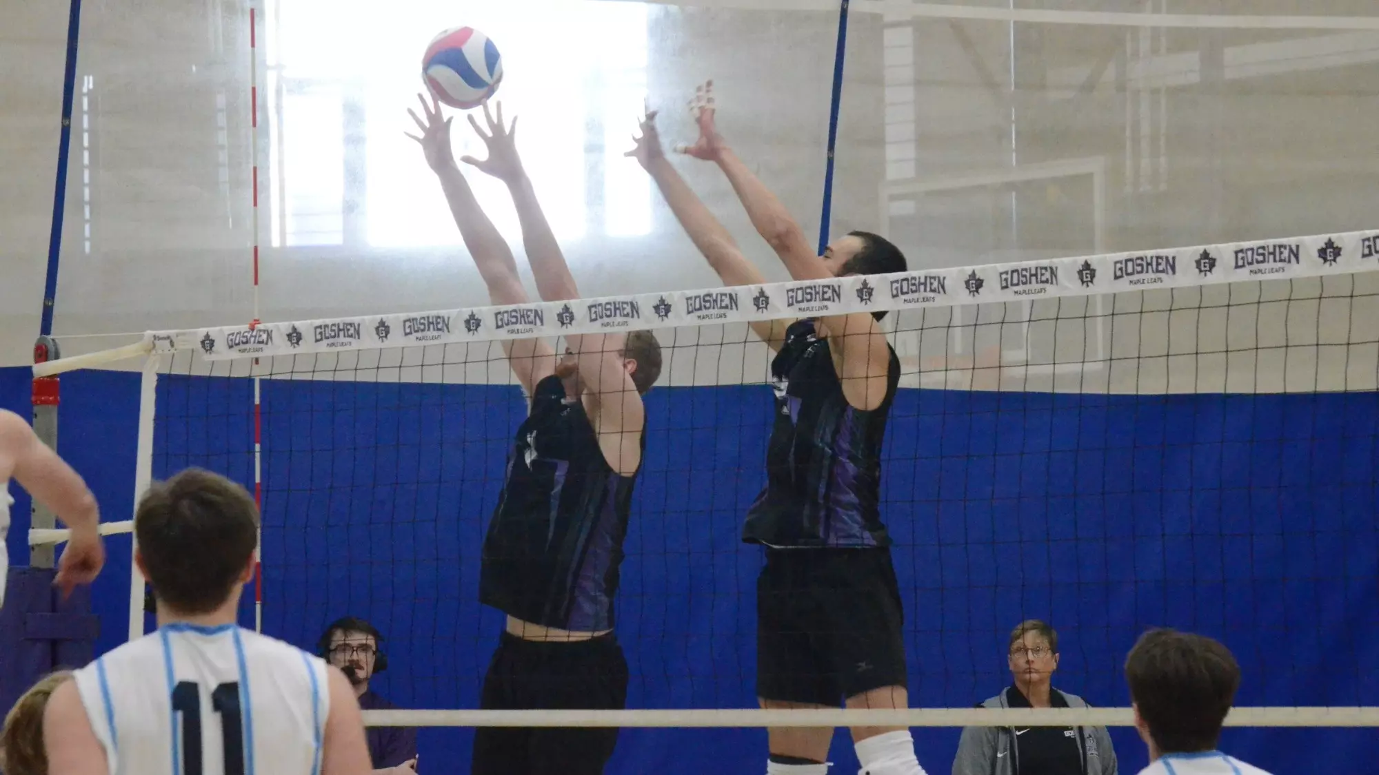 Bennett and Rodriguez go for a block