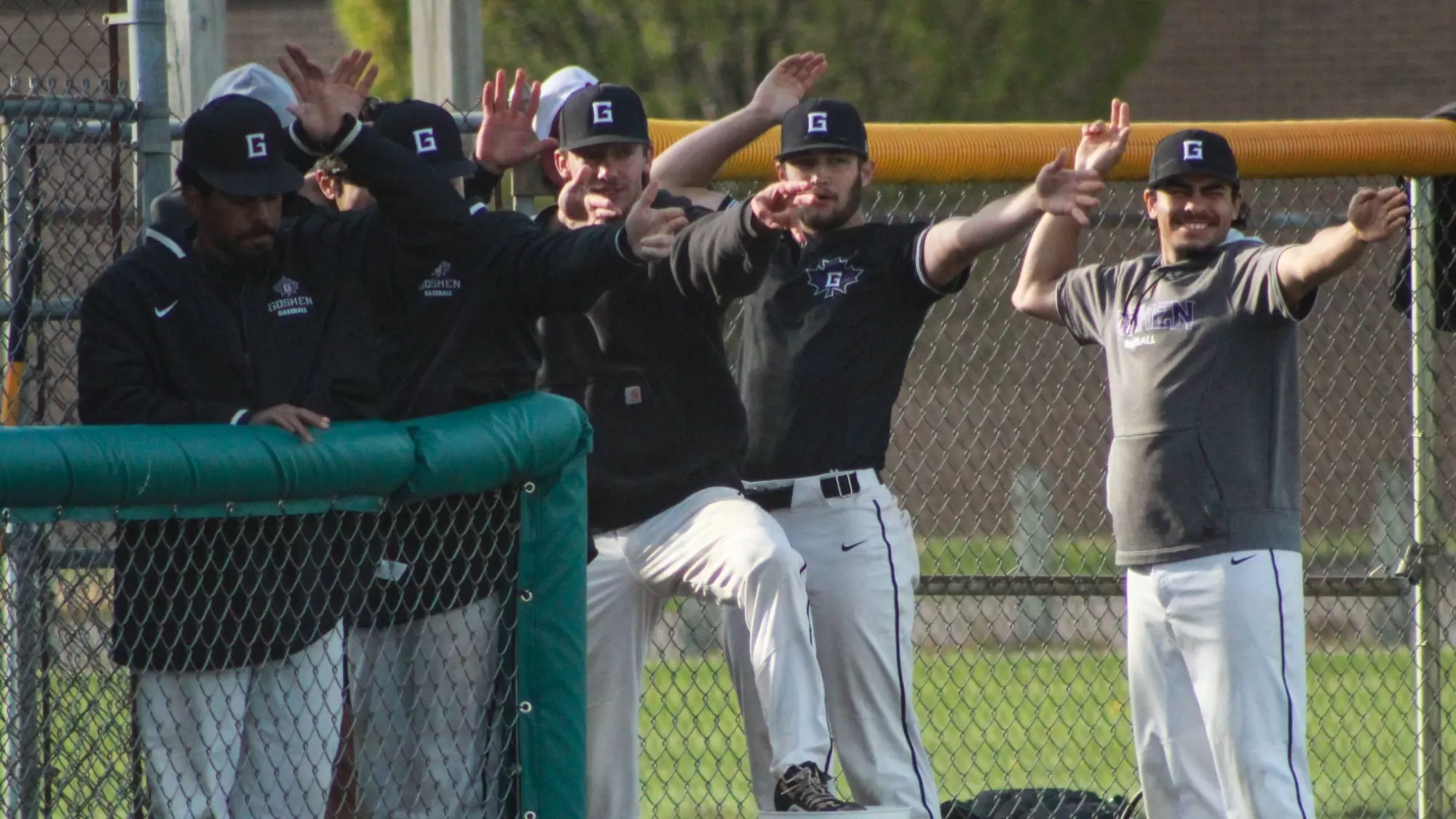 Baseball team doing sprinkler