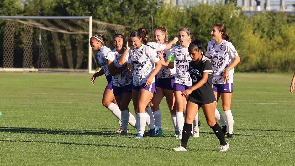 Women's soccer celebrates a goal