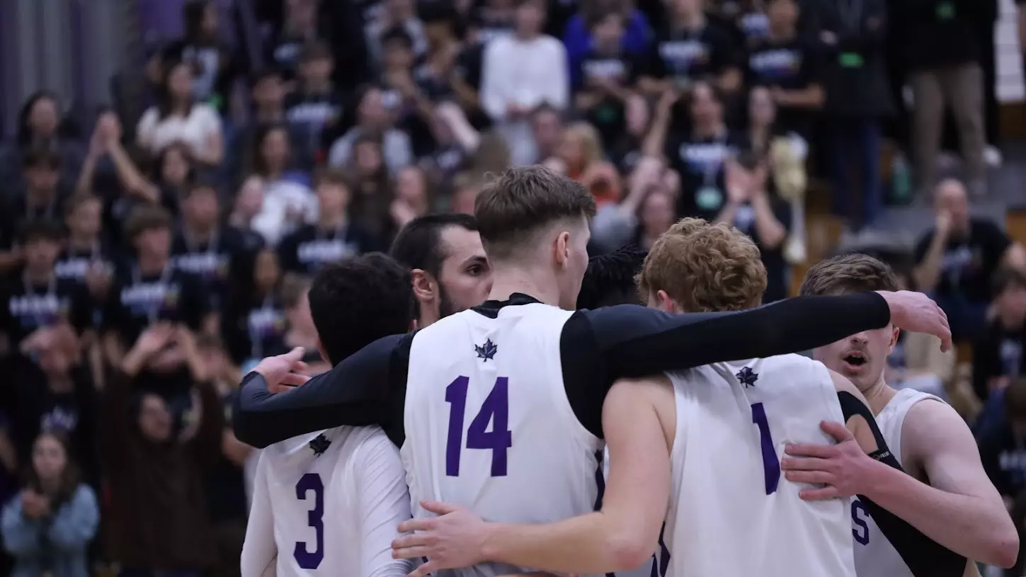MVB huddle in front of fans