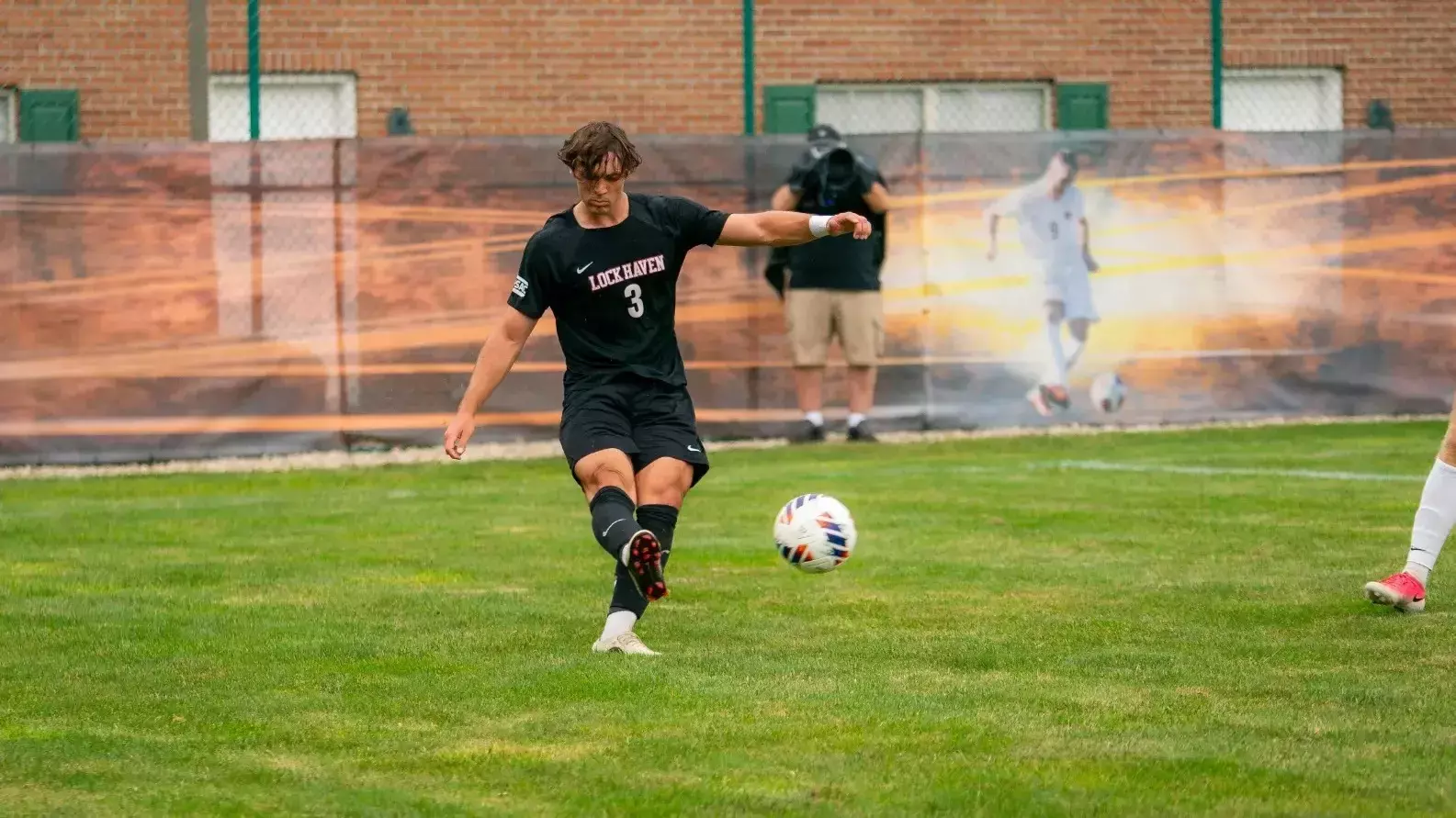Men's soccer player Owen Lichtenwalner in action
