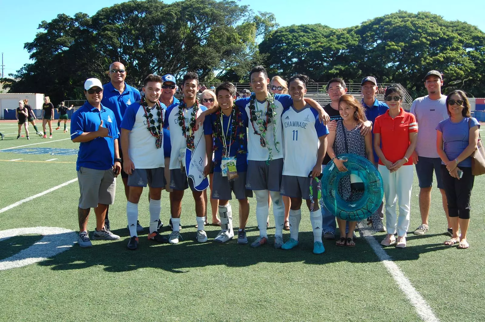 Men's soccer seniors with families on Senior Day