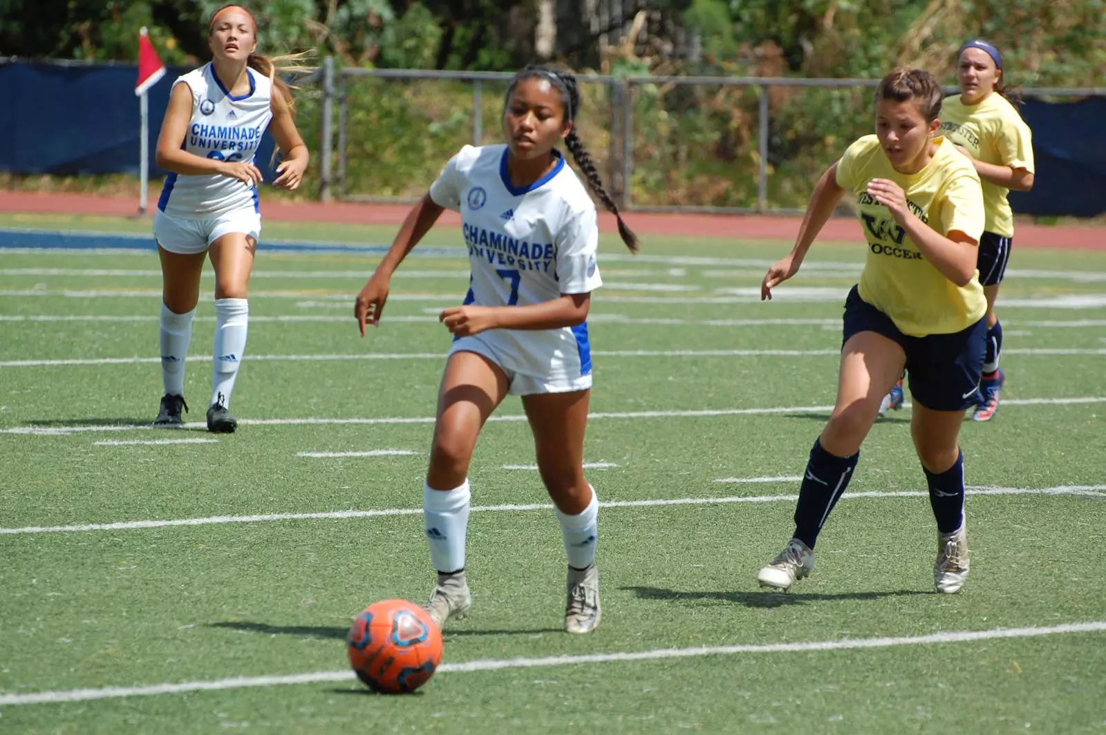 Breanna-Leigh Bactista chases a ball vs. Westminster