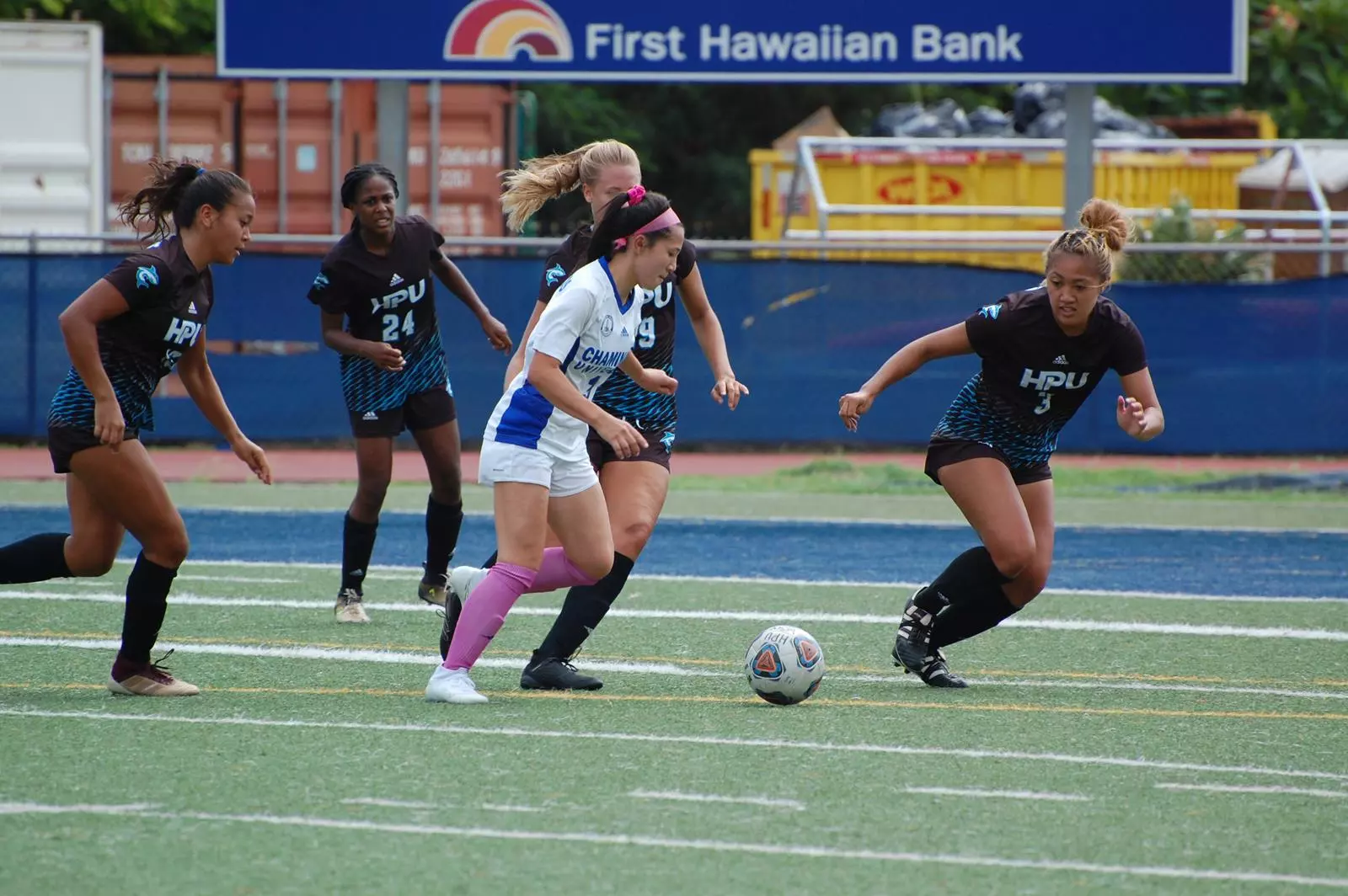 Randi Fontes takes the ball downfield vs. HPU