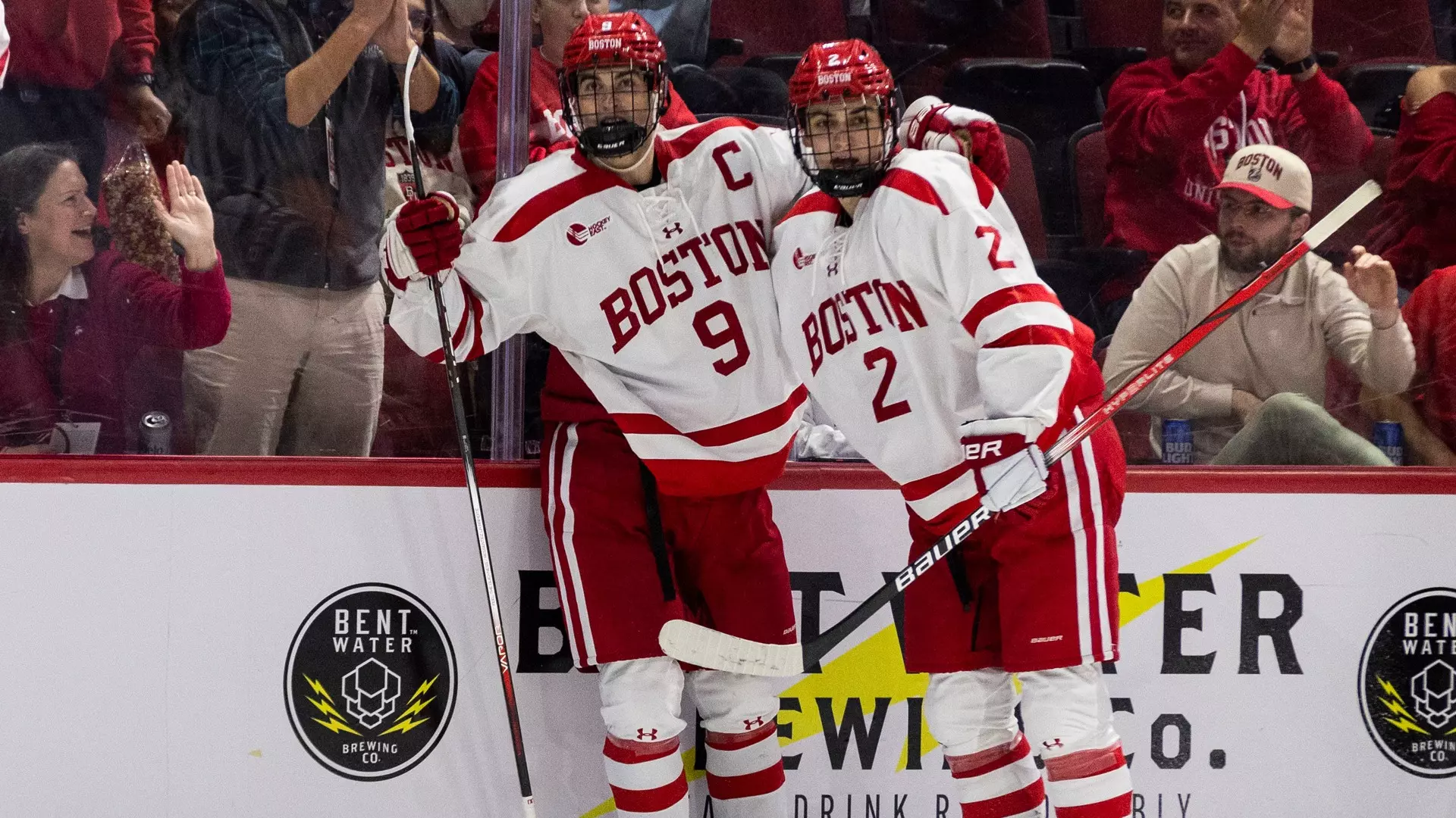 Ryan Greene and Gavin McCarthy celebrate a goal at Agganis Arena