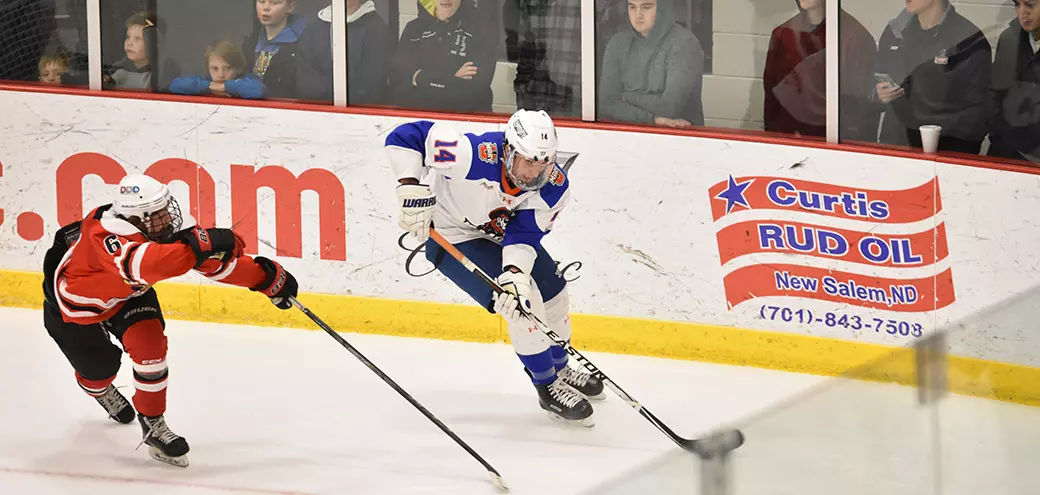 Nagurski pushes puck up ice