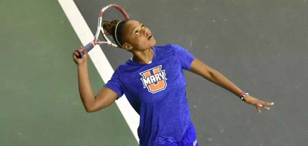 Dembo winds up for serve