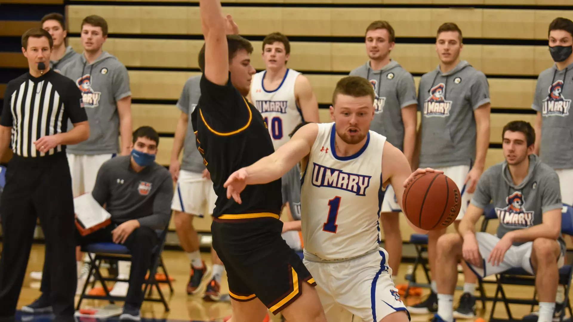 Matthew Johnson drives the baseline against the Golden Eagles