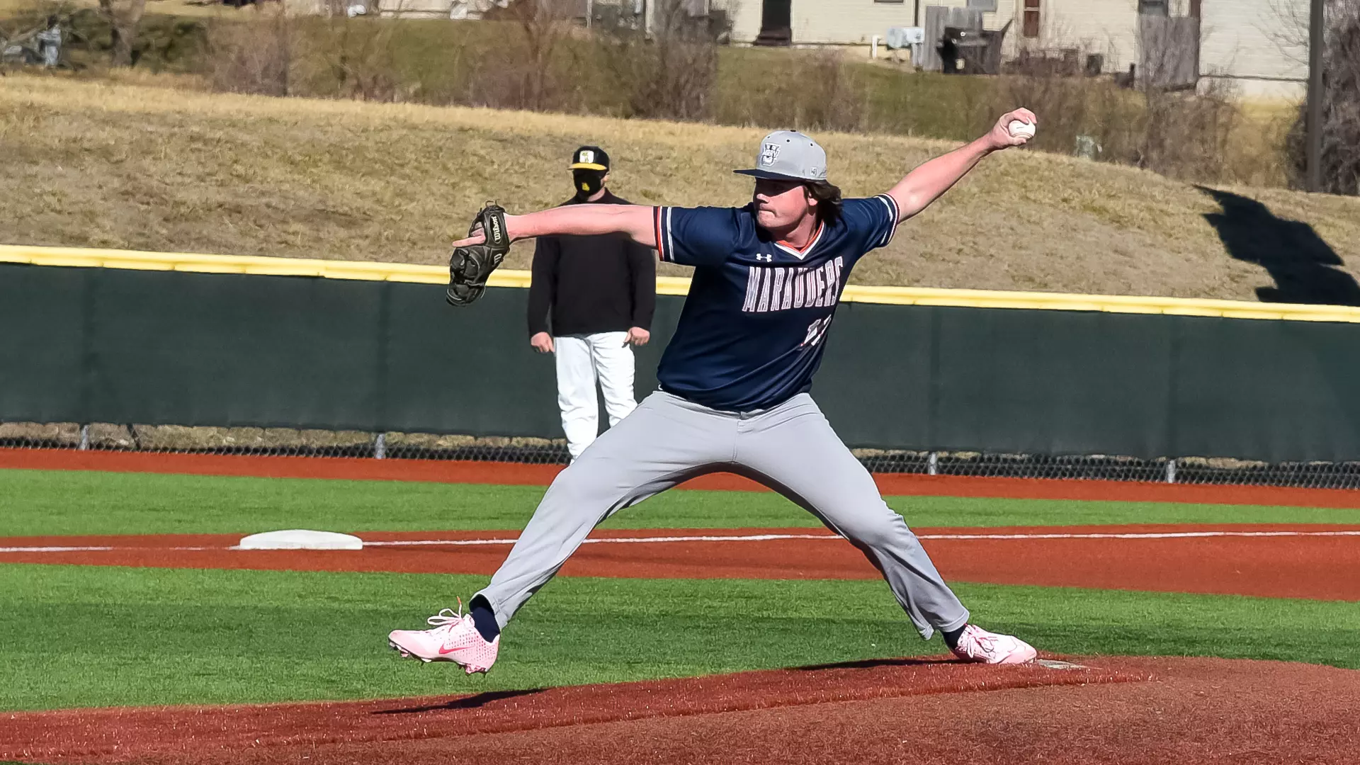 Austin Wagner delivers a pitch in the 2021 season opener