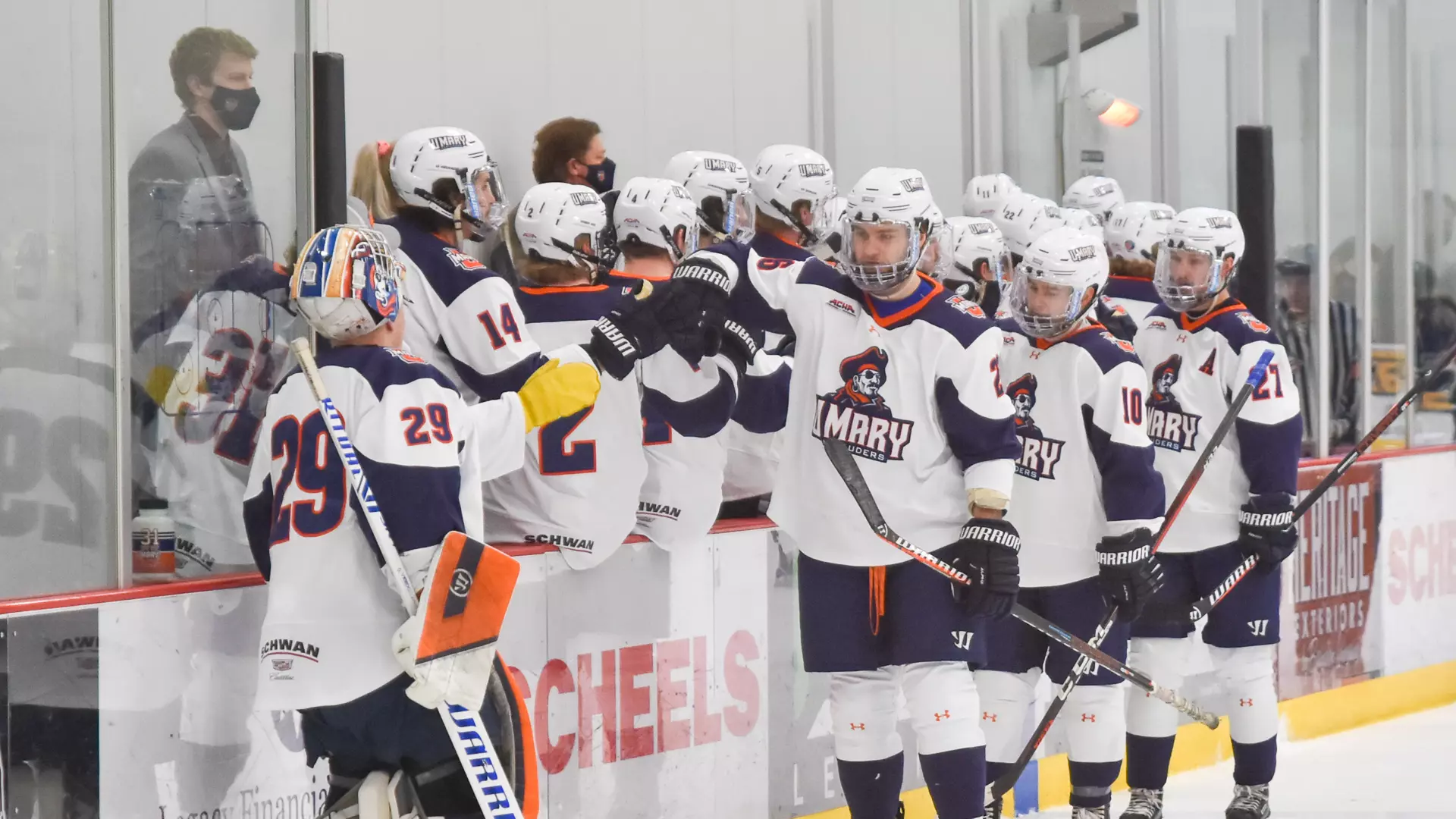 Marauders celebrate a goal on the bench