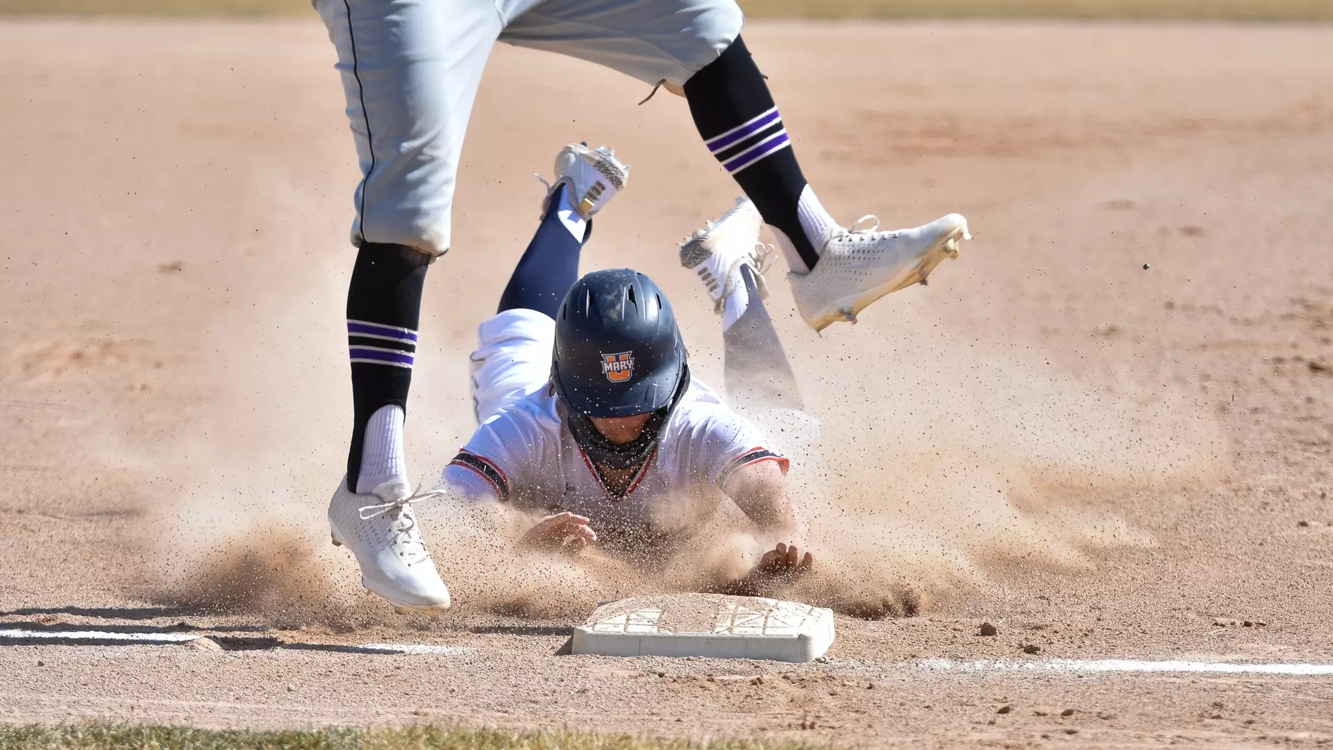 Marauders baserunner slides safely into third base