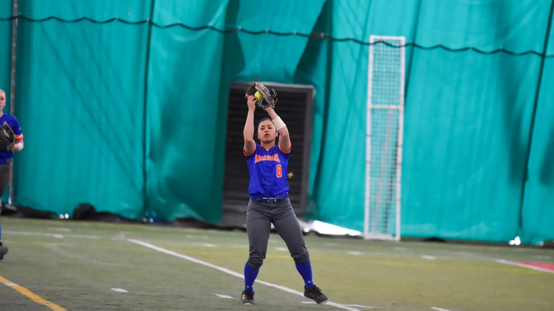 Mikaela Pelesauma catching popup