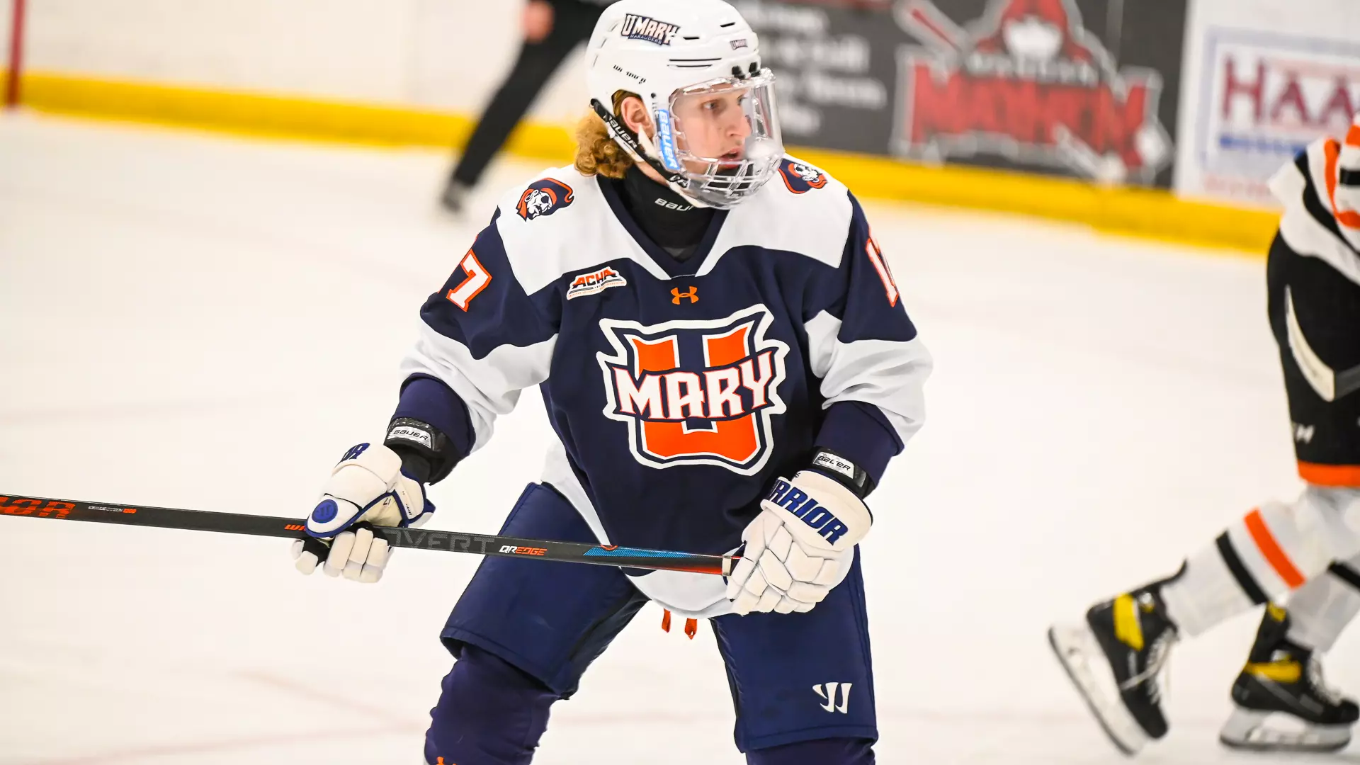 Derek Dropik looks for the puck