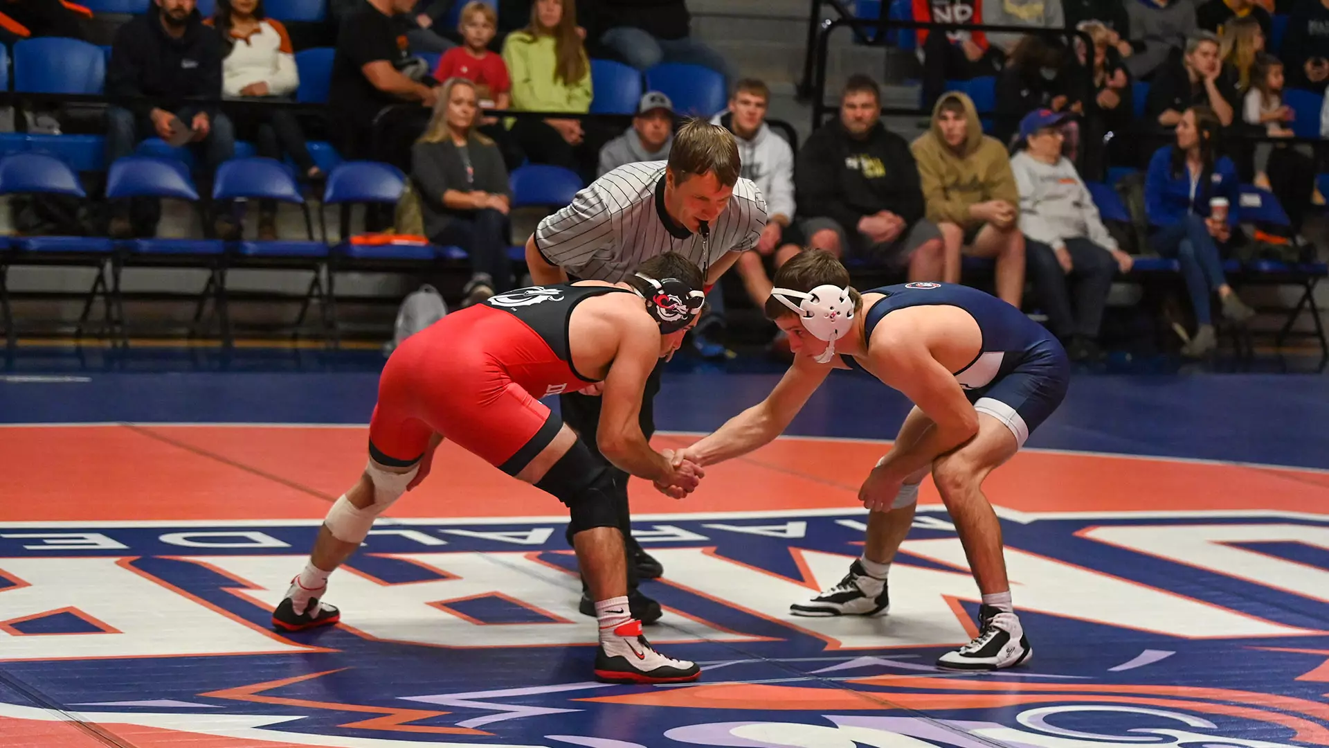 Wrestling shakings hands before match against MSUM