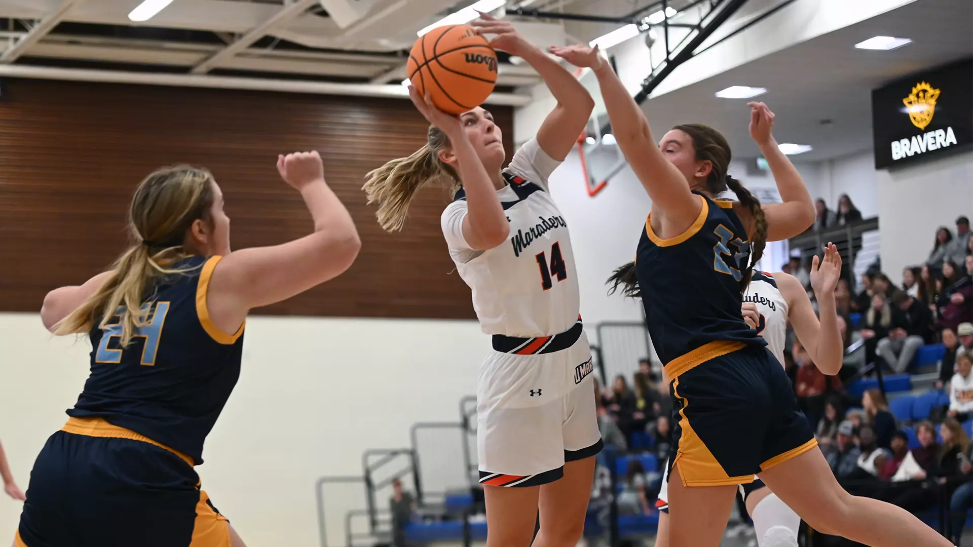Ryleigh Wacha glides past two defenders