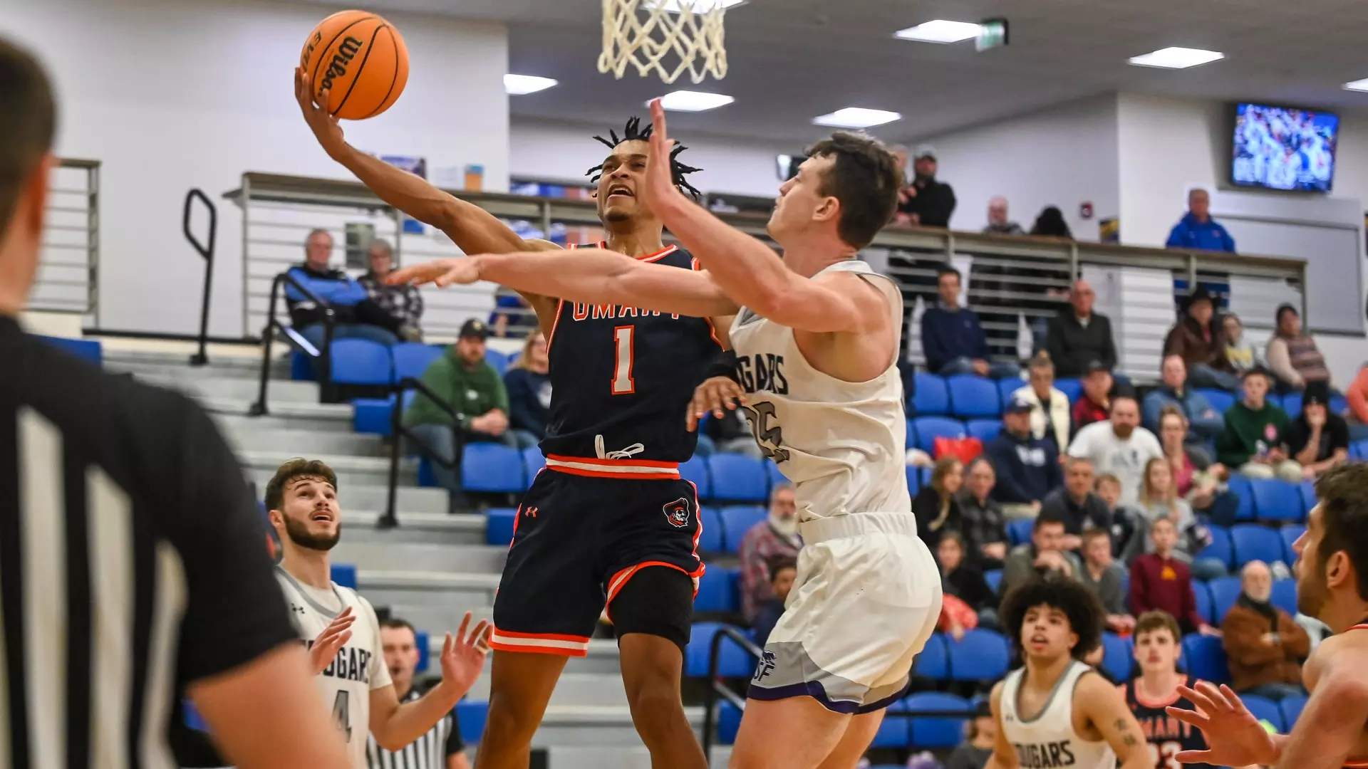 Zyon Smith scores at the rim against Sioux Falls