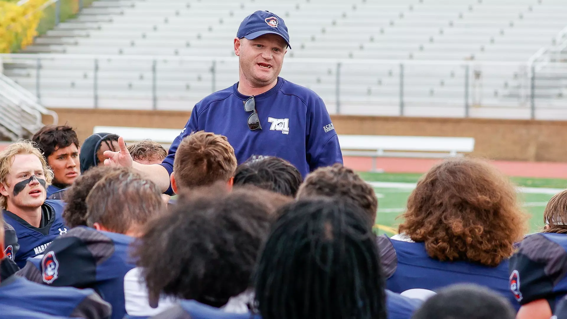 Head coach Craig Bagnell adresses the Marauders after a 2022 home win over Northern State