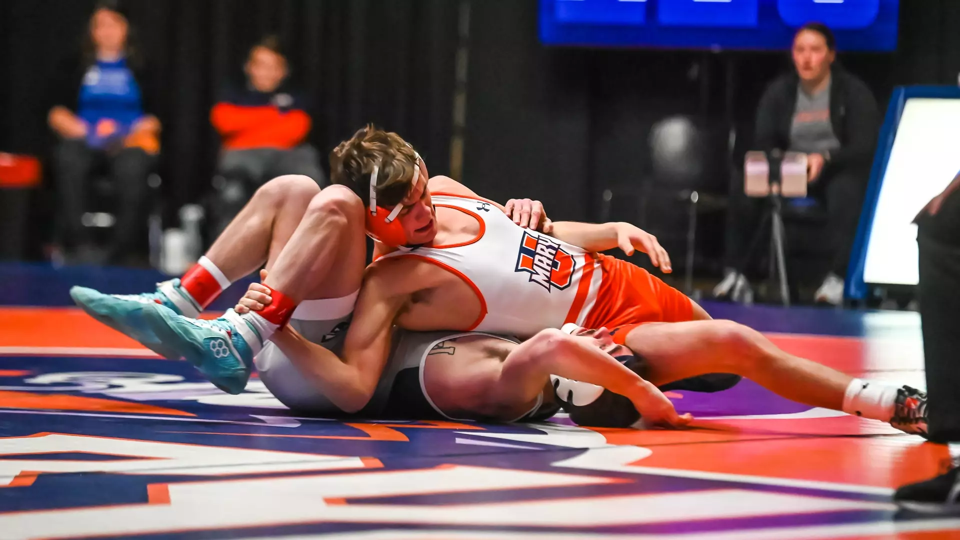 Jaden Verhagen rolls onto opponent for two points