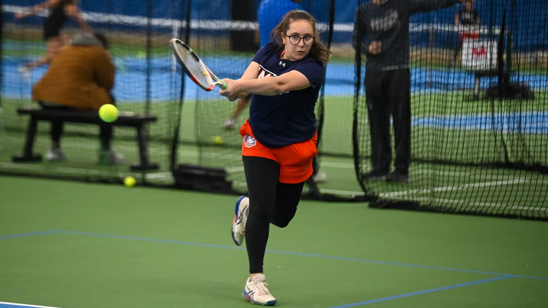 Hala Hossam Awad swings through a backhanded return