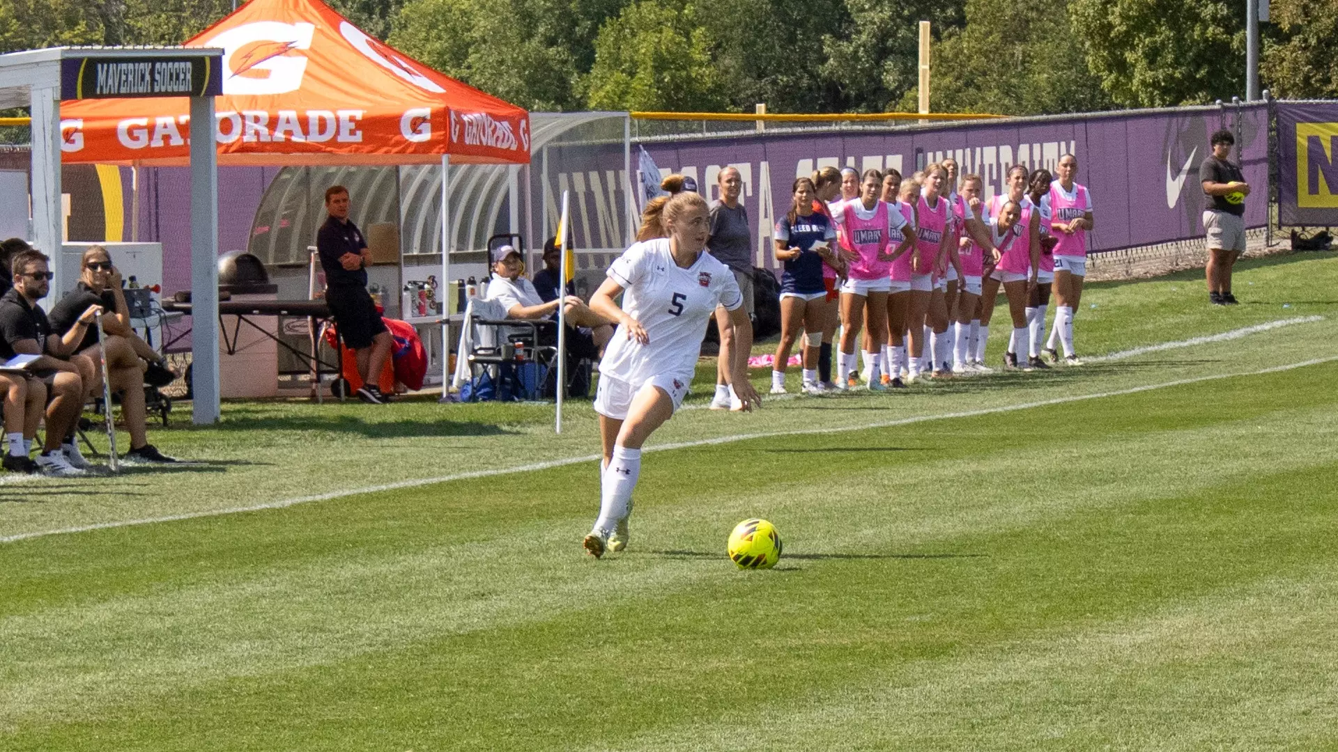 Sophia Lange plays the ball in front of the Marauders bench
