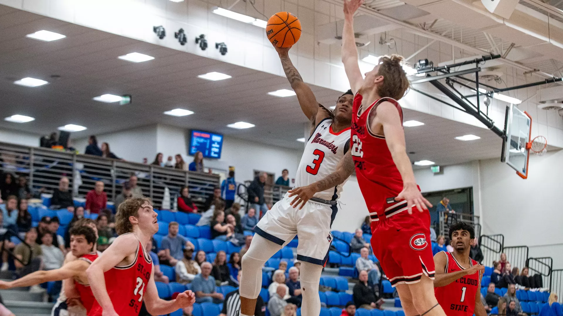 Marquel Saleek attacks the basket