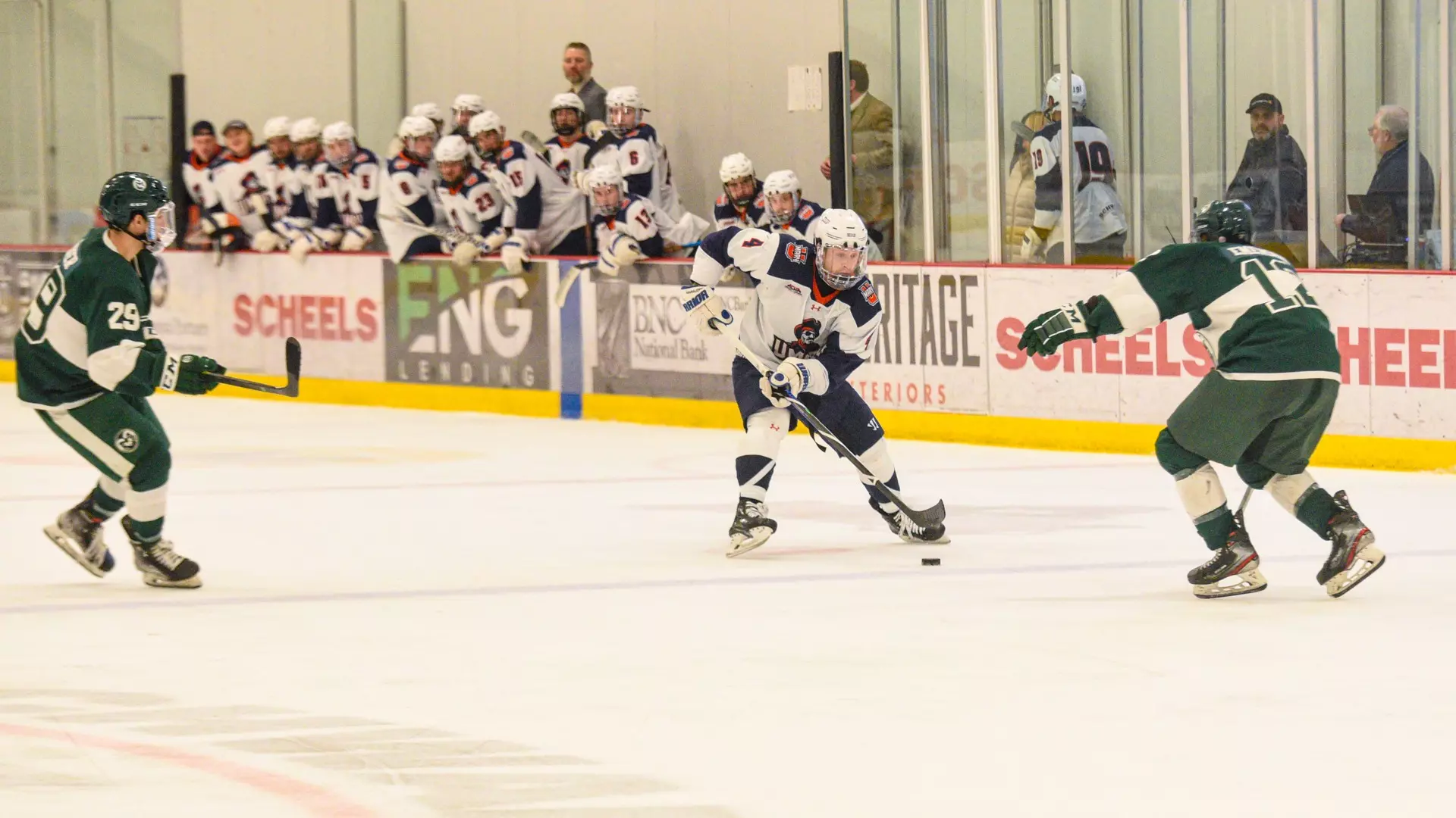 Michael Heitkamp carries the puck into the Rams defensive zone