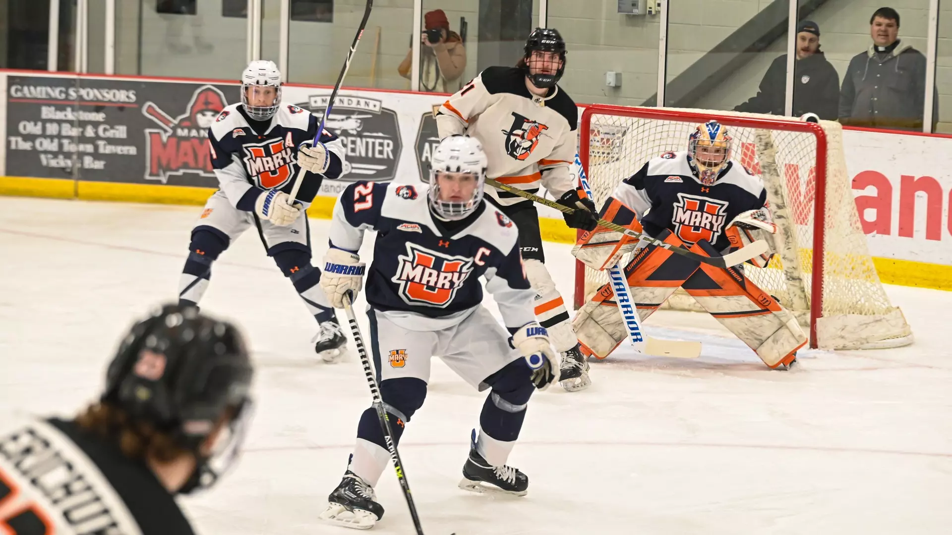 Johnny Witzke and Kyle Hayden protect the net