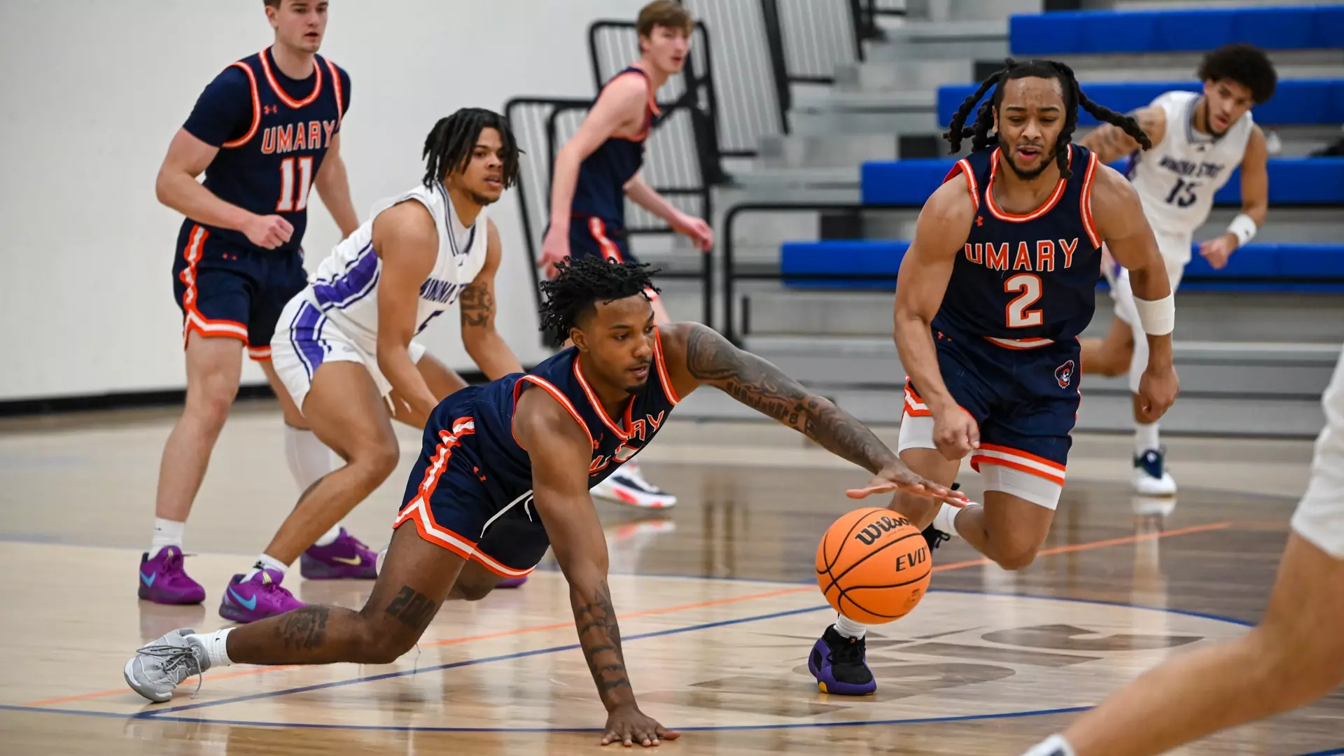 Xavier Lewis dives on lose ball