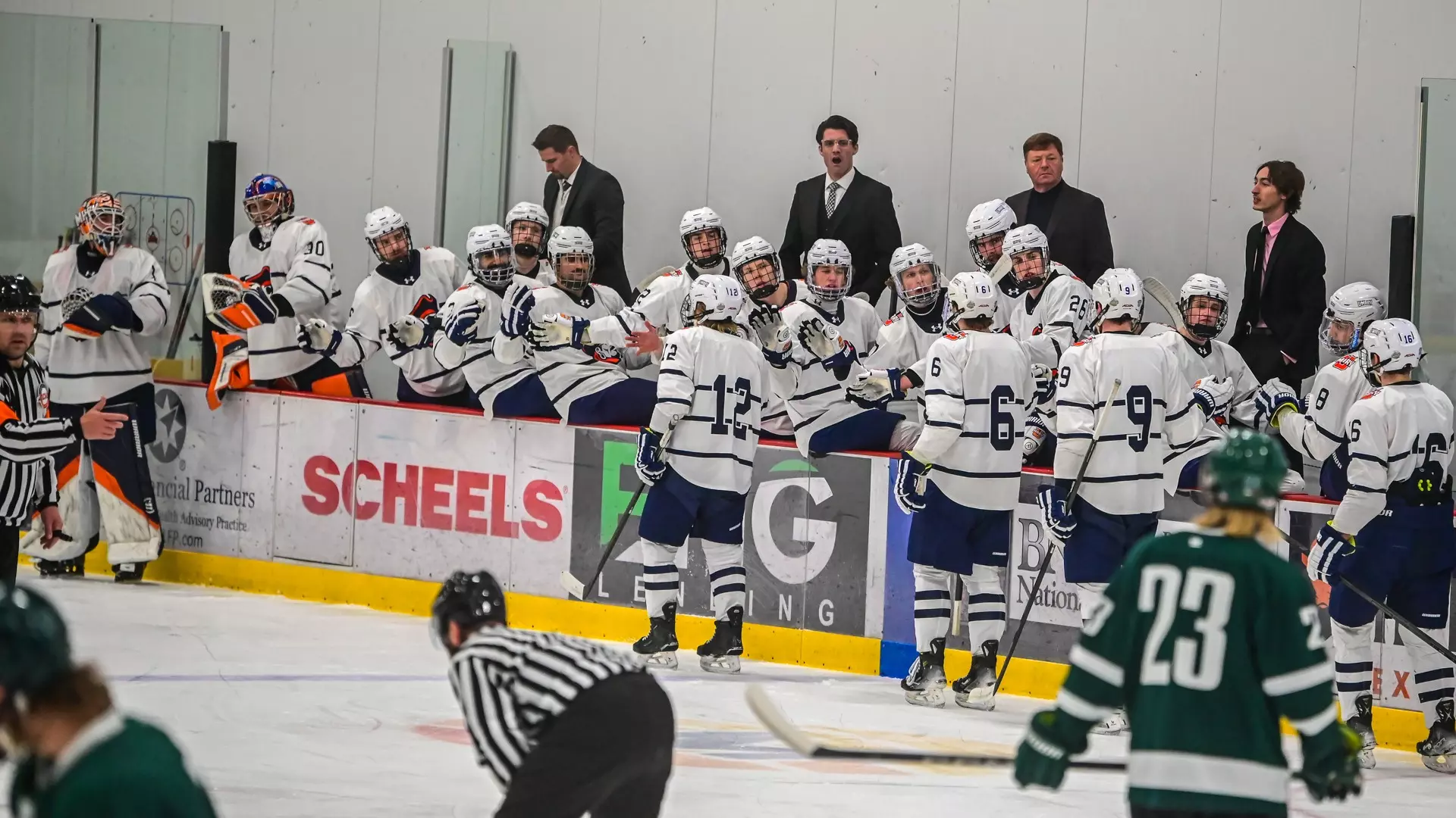 Marauders bench celebrates goal