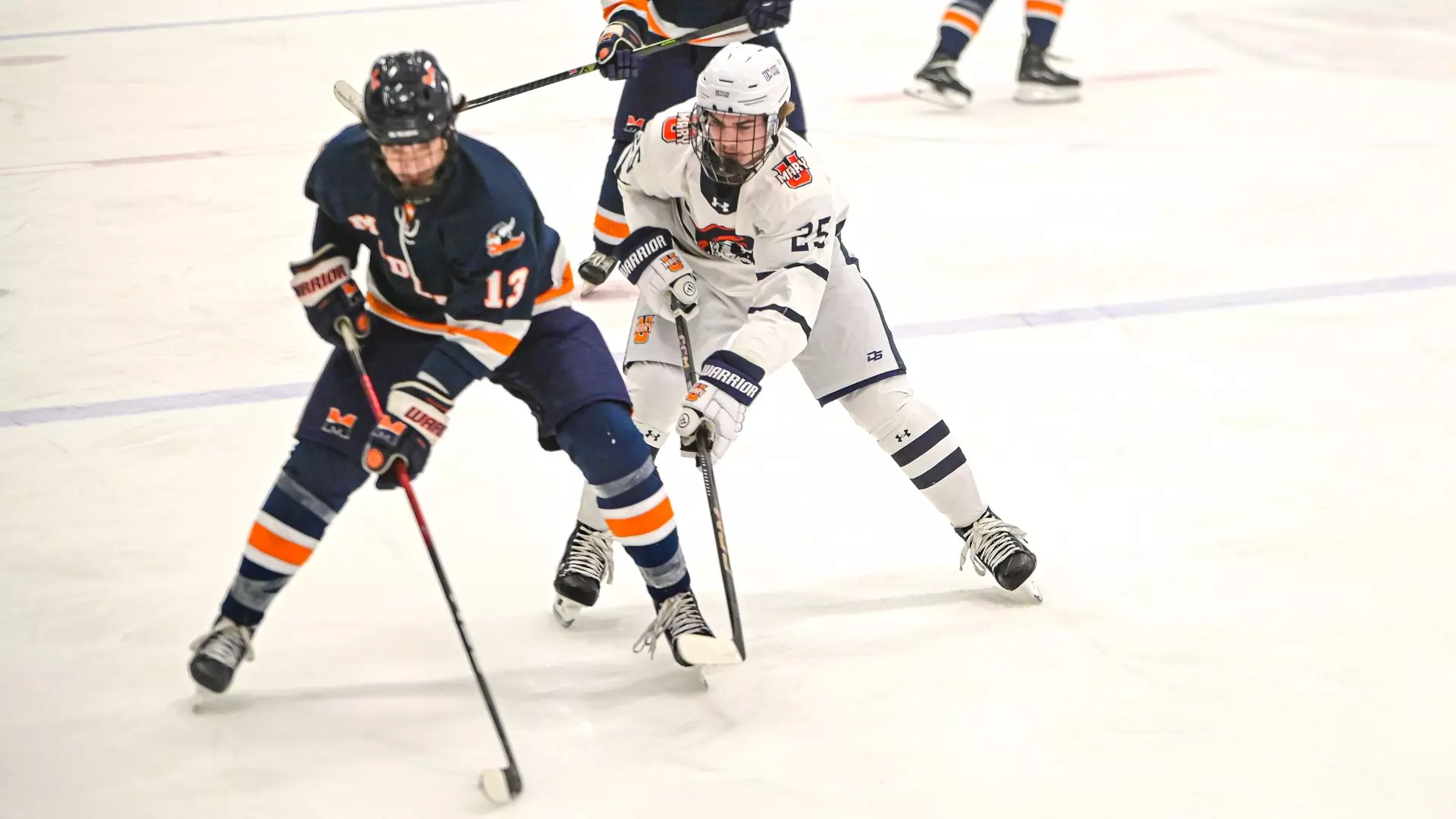 John Lang goes for puck