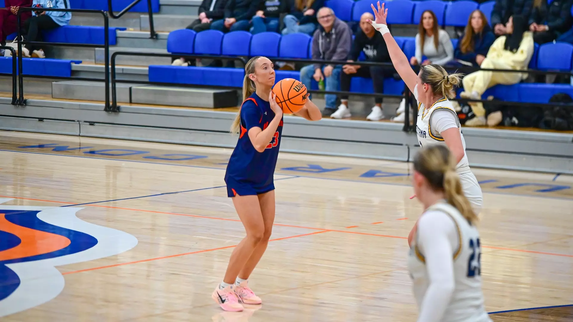 Emily Jaenke shooting a three against Augie