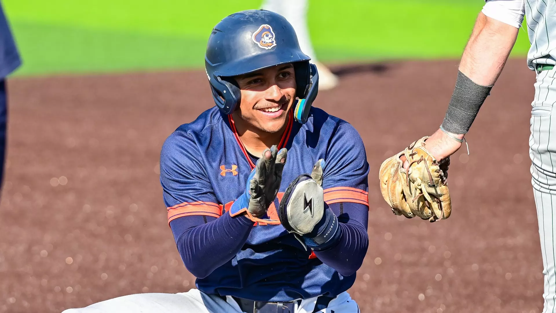 Mikey Ramirez celebrates at third