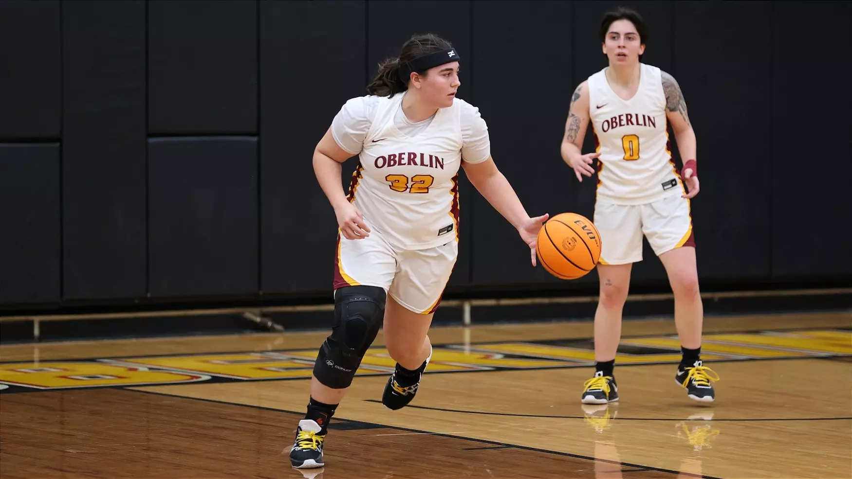 Zinaich, Camille dribbling basketball