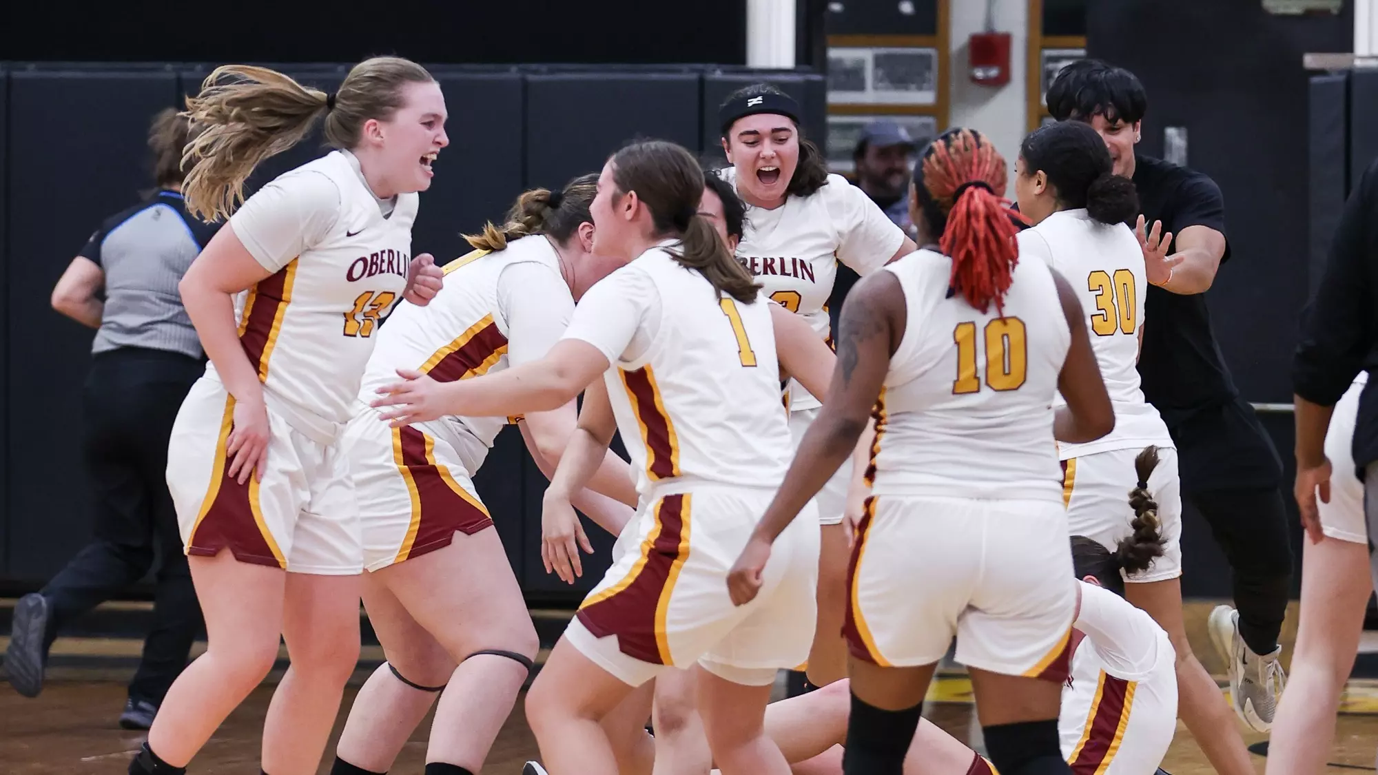 WBB Celebrating 2OT Victory over #19 Baldwin Wallace