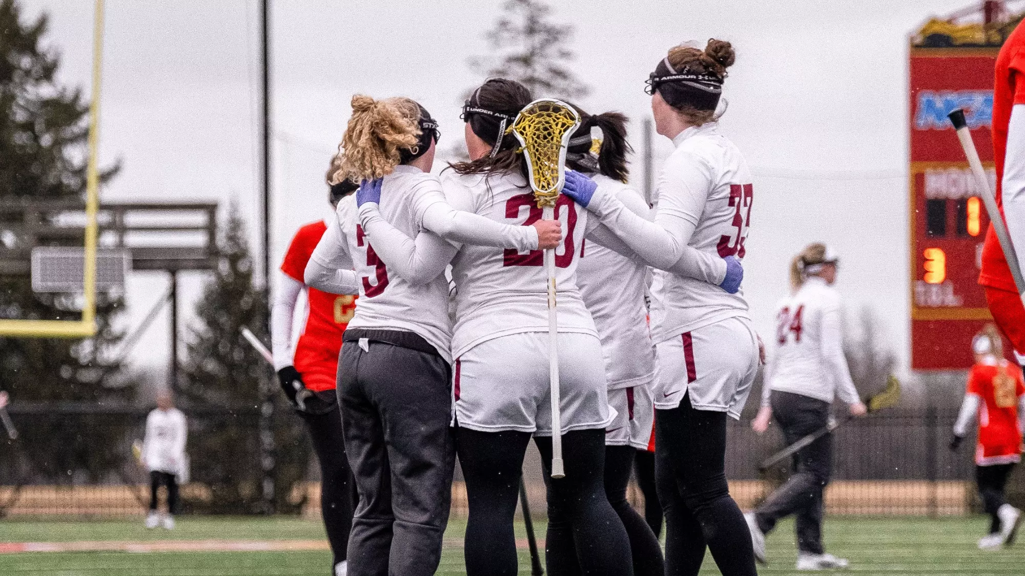 Women's Lacrosse team huddle