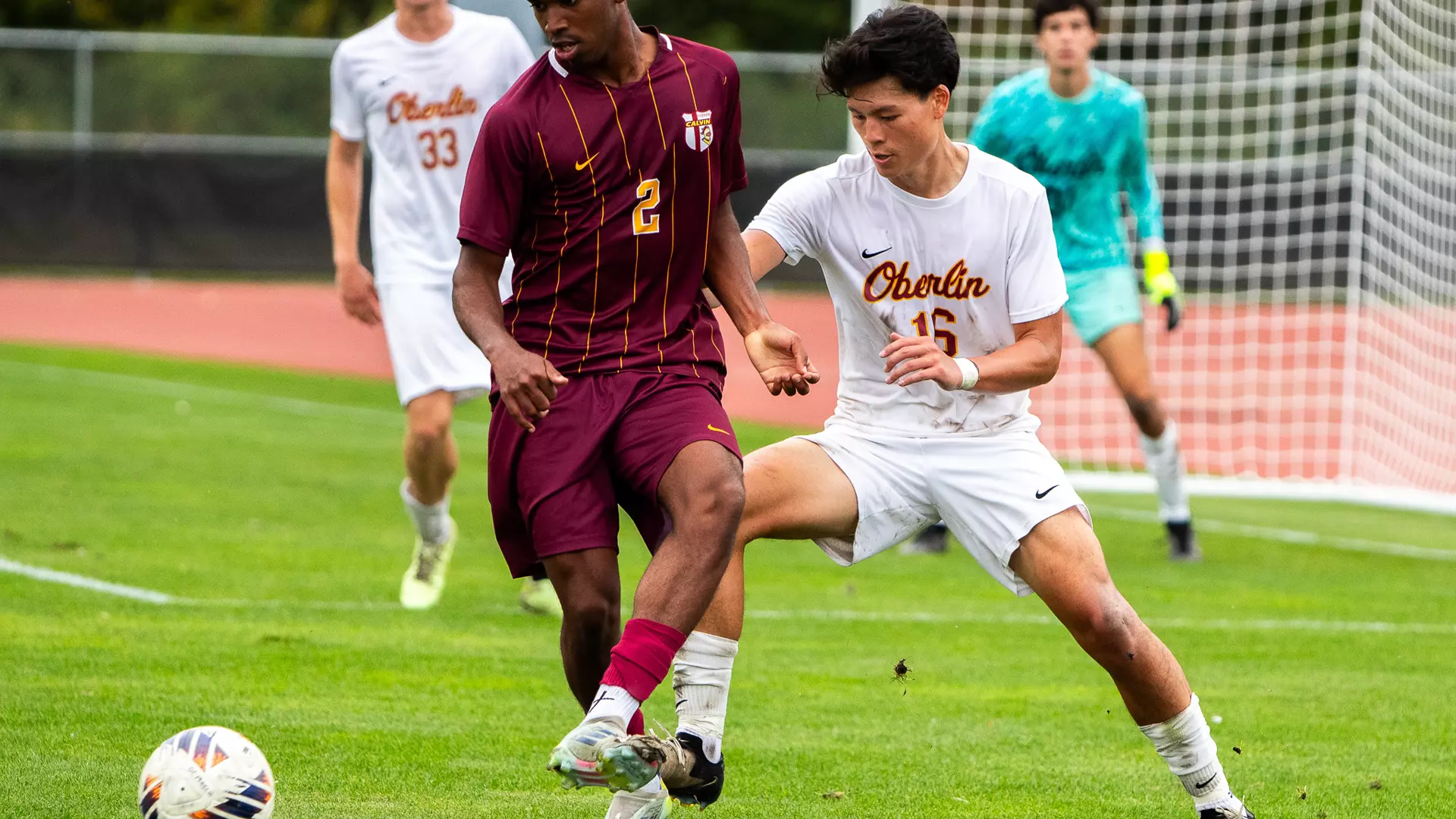 Brendan Tan navigating around a defender to get the ball