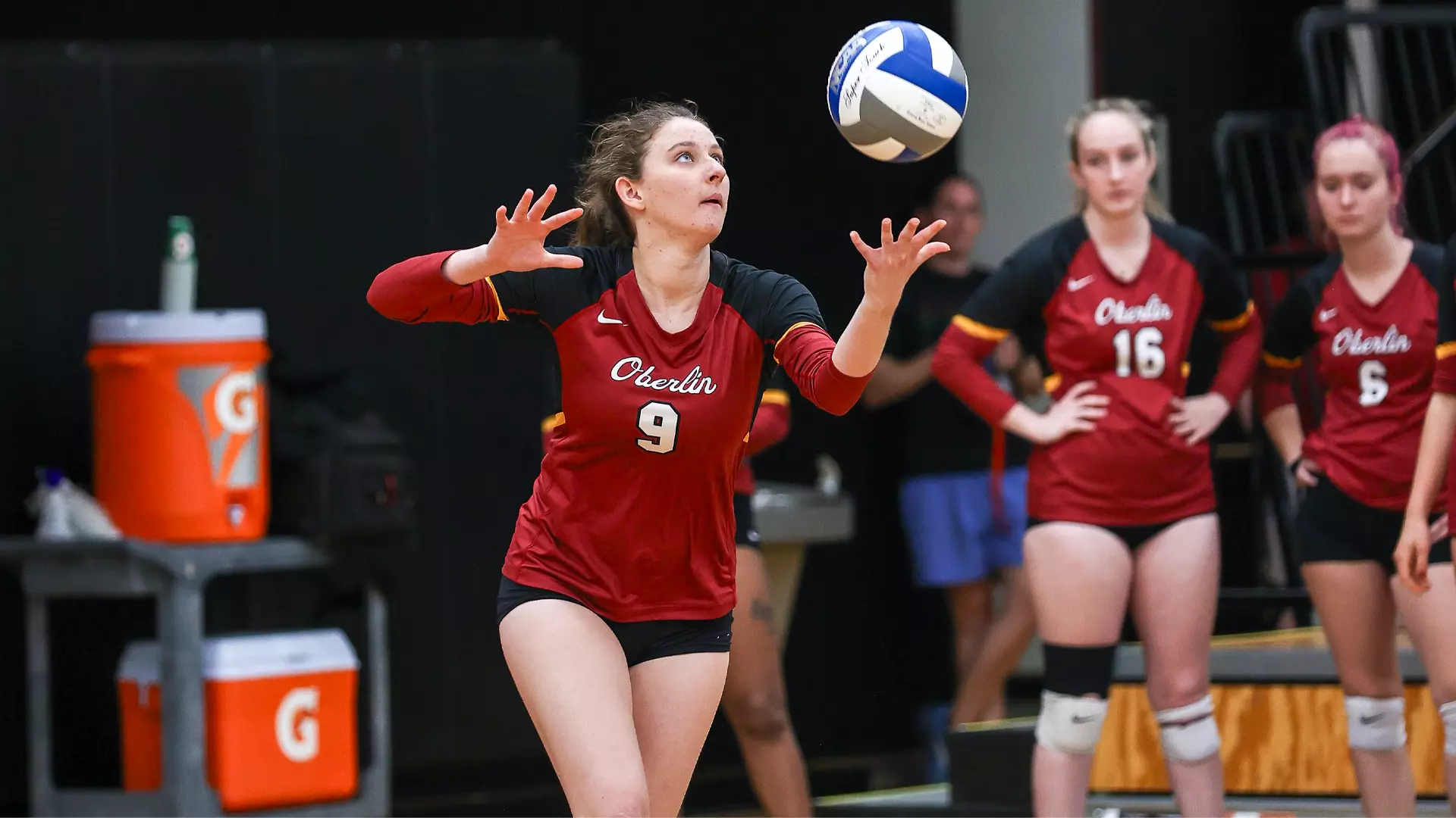 Evelyn Welton serving the ball