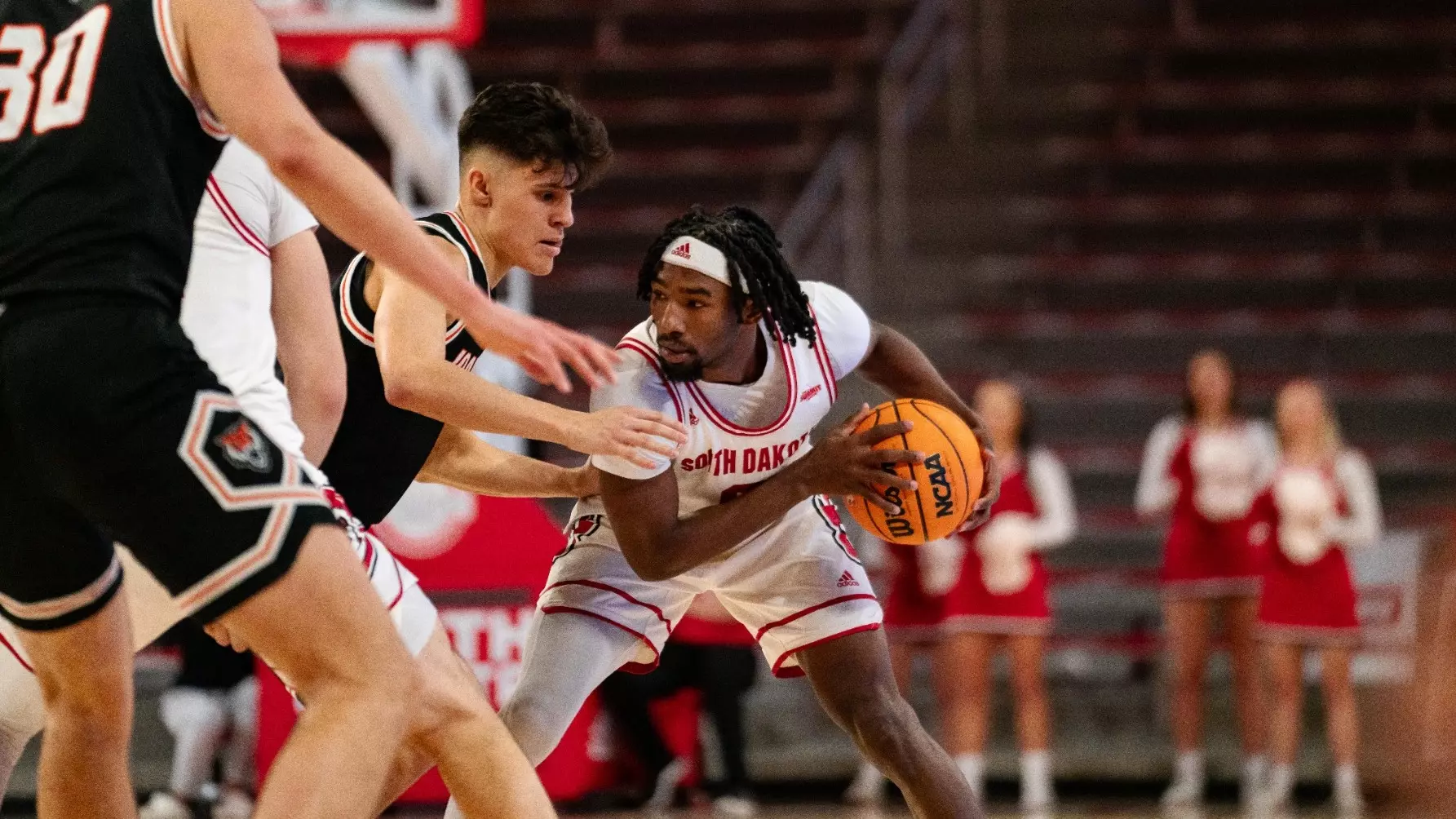 12424 MBB Chase Forte with the ball against Idaho State