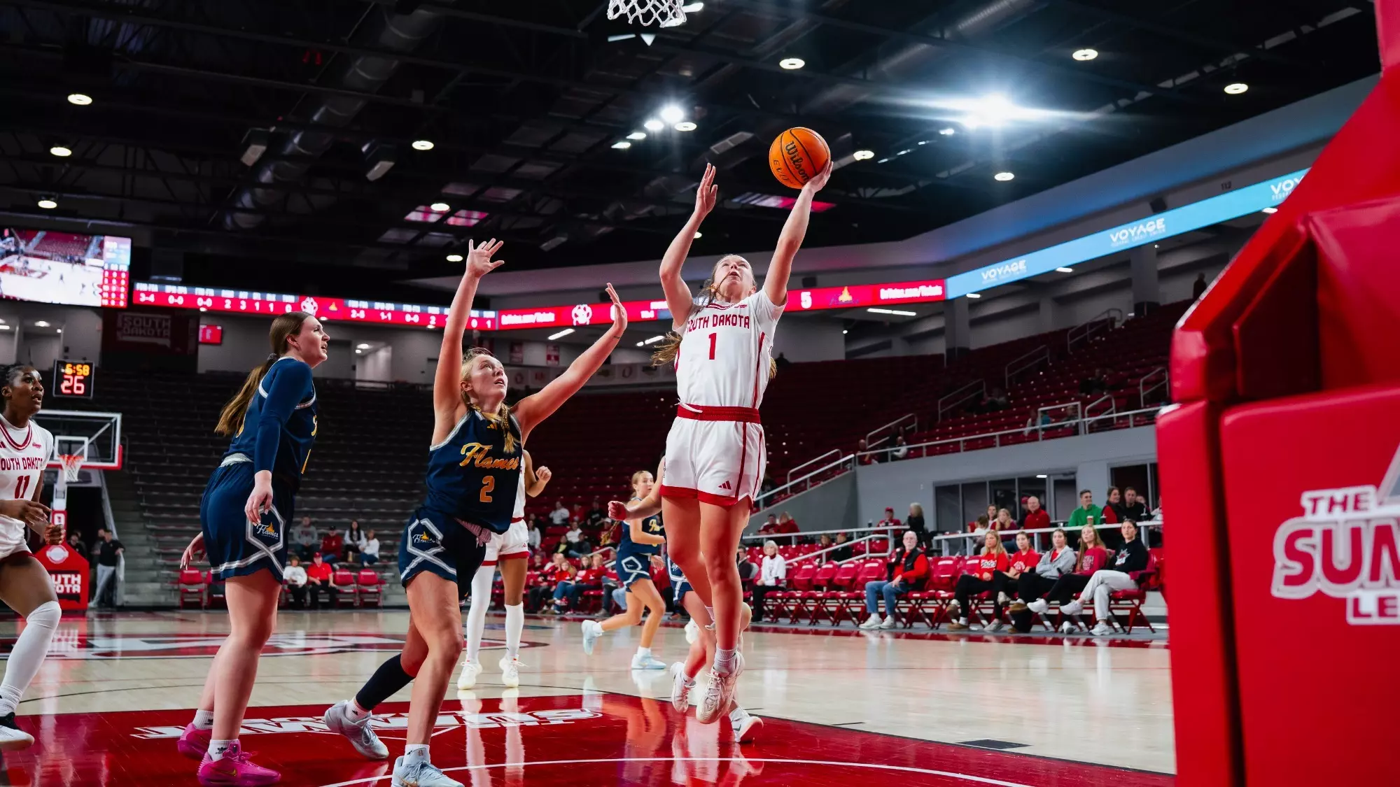 Molly Joyce goes up for a lay up against College of Saint Mary Tuesday in the SCSC
