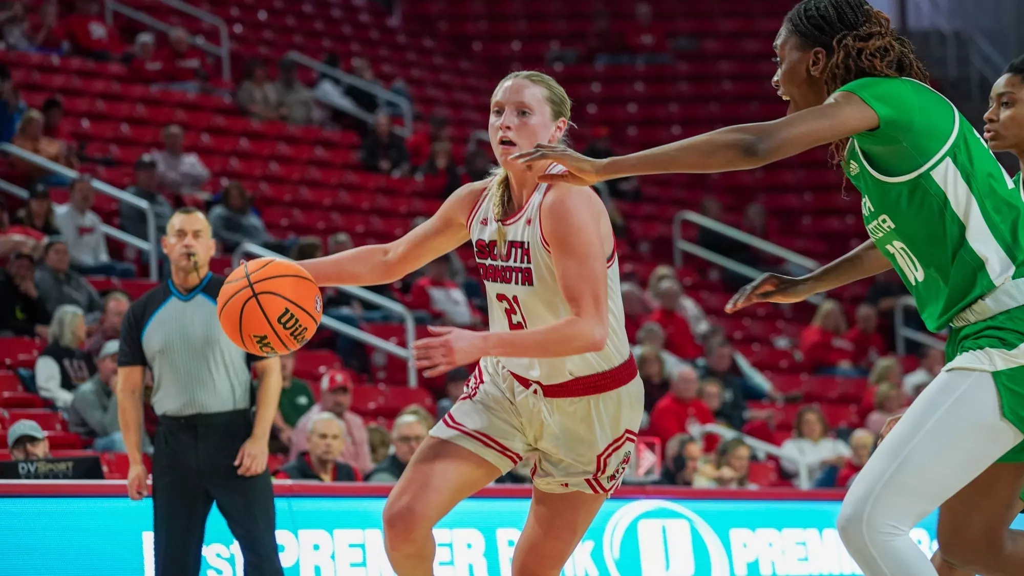 Grace Larkins drives to the hoop