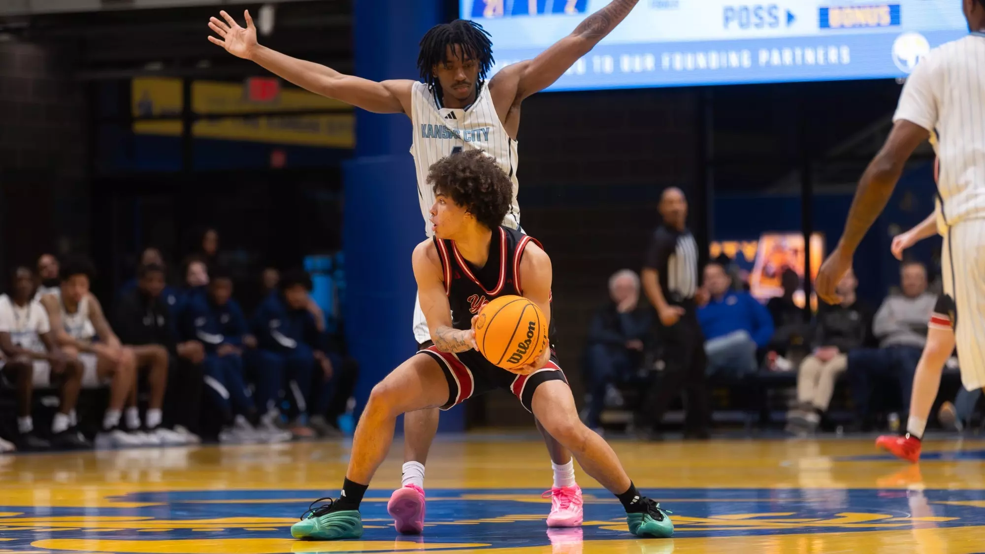 Uzziah Buntyn with the ball at halfcourt agains the Roos 020426