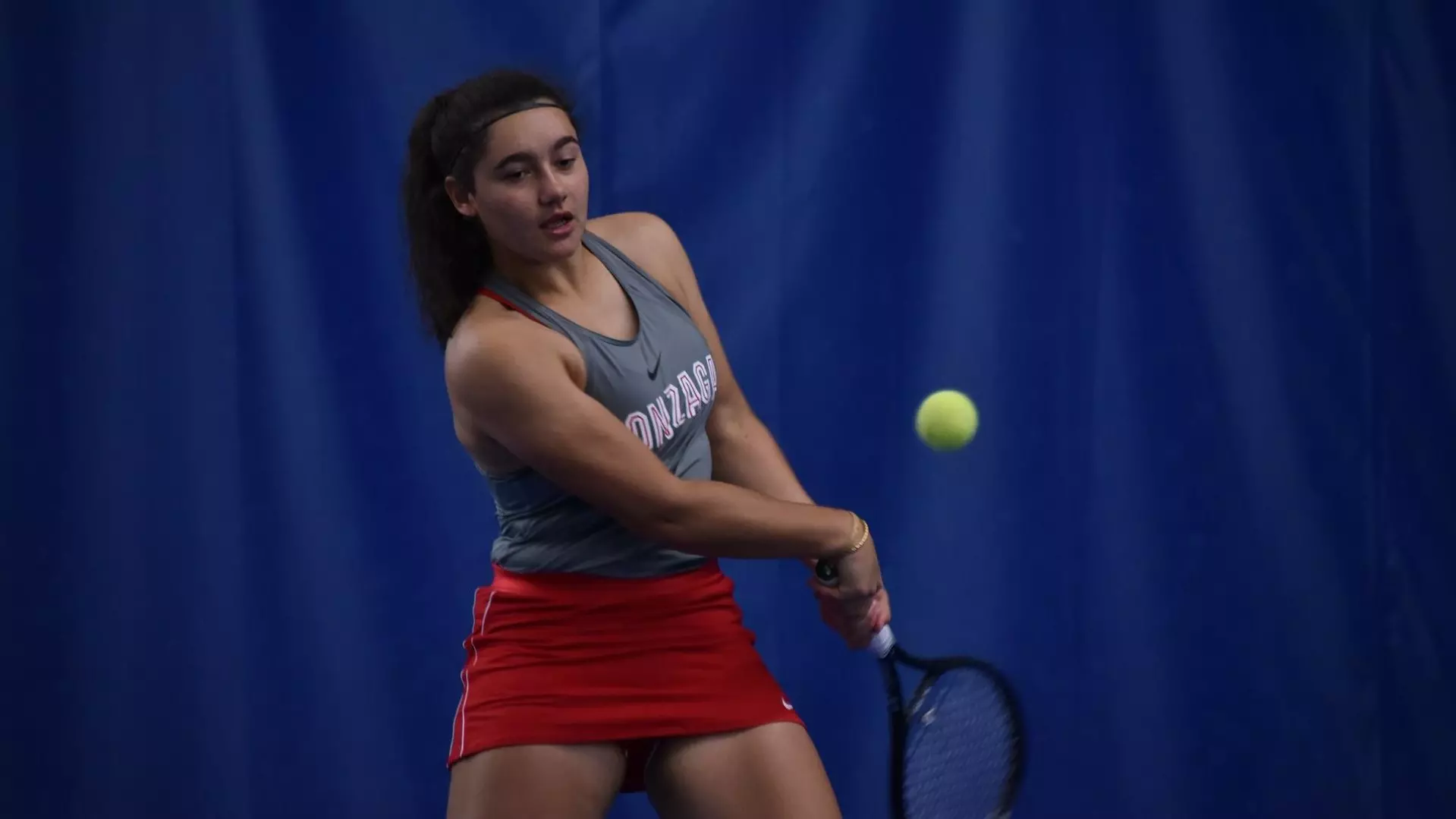 Tamara Anderson prepares to hit a backhand