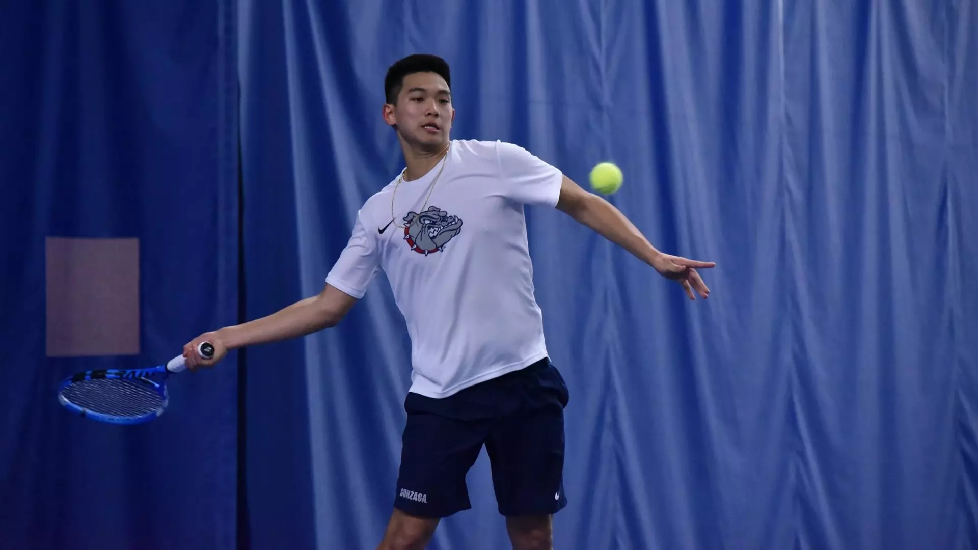 Bryan Husin hits a forehand