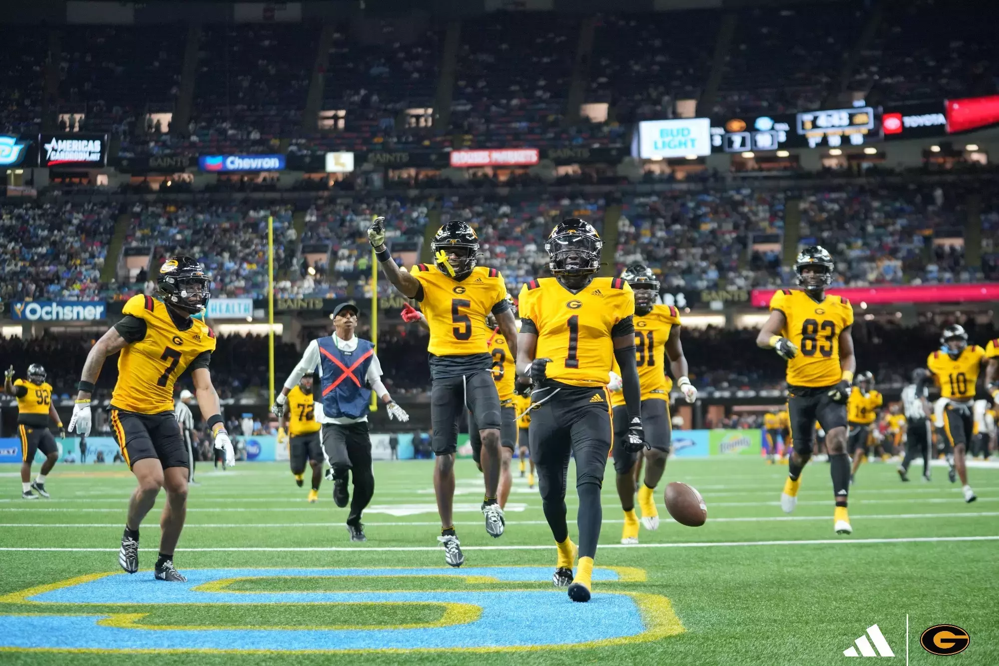 Grambling State football players celebrate in the Caesars Superdome during the Bayou Classic