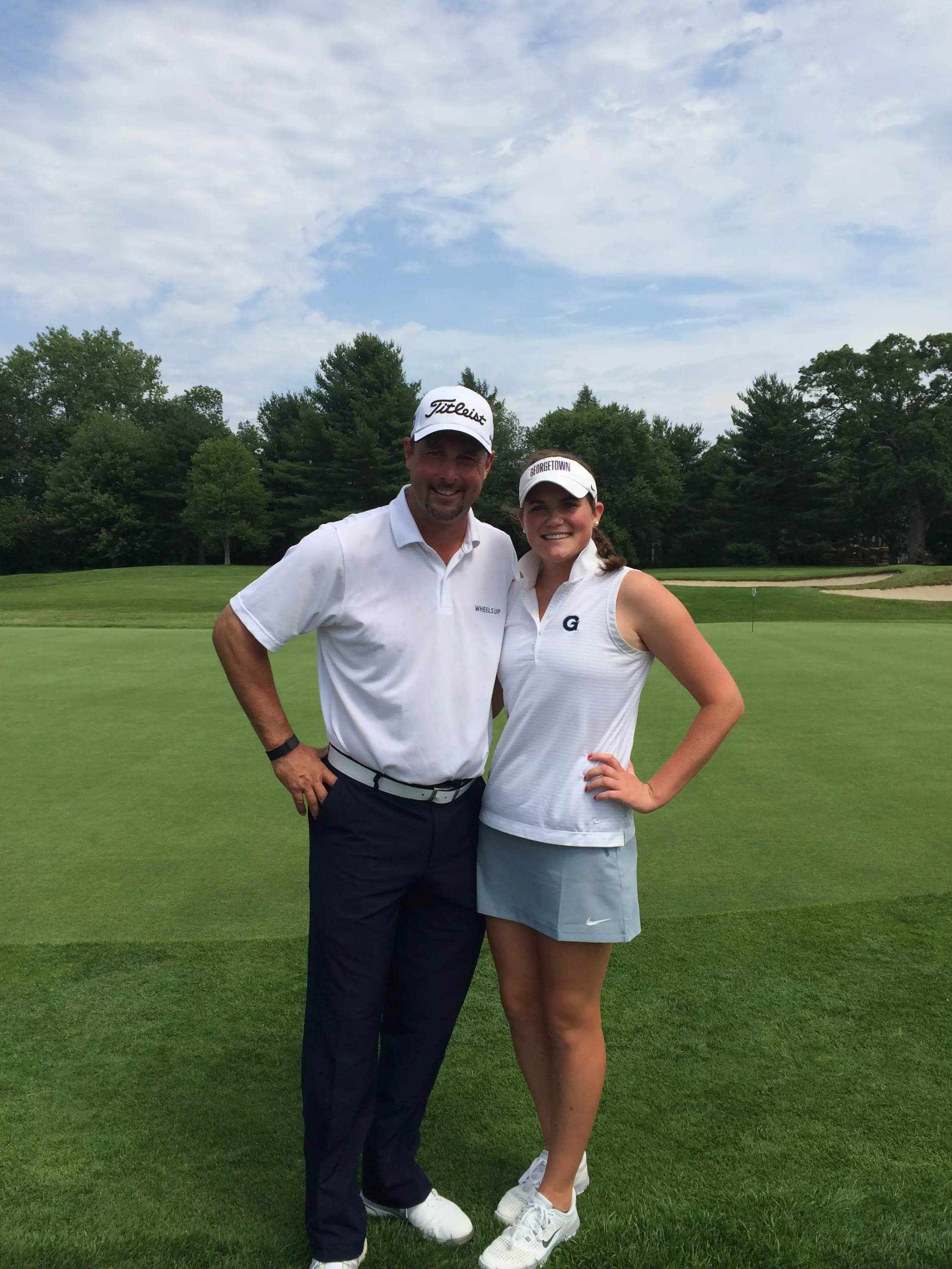 Georgetown sophomore golfer Jacquelyn Eleey with Boston Red Sox legend Tim Wakefield.