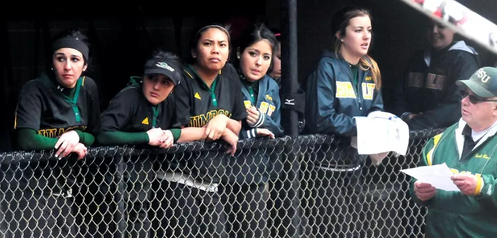 Players in the dugout.