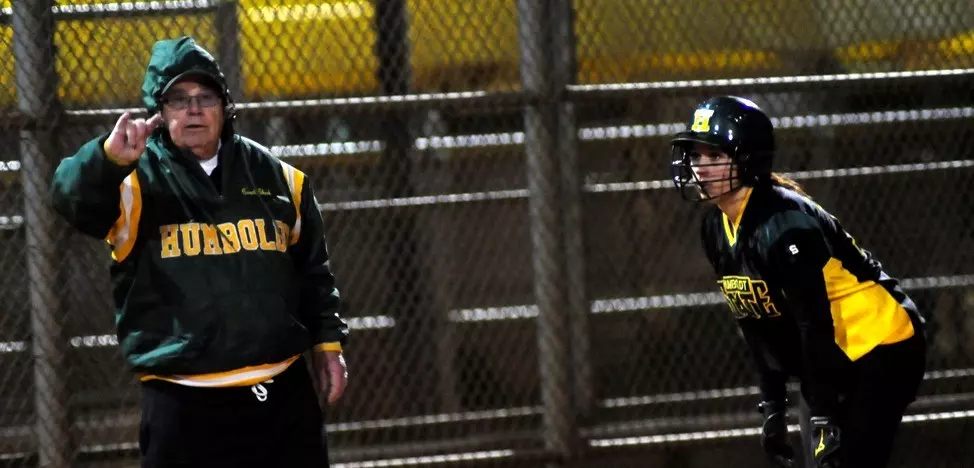 Coach Cheek at third base