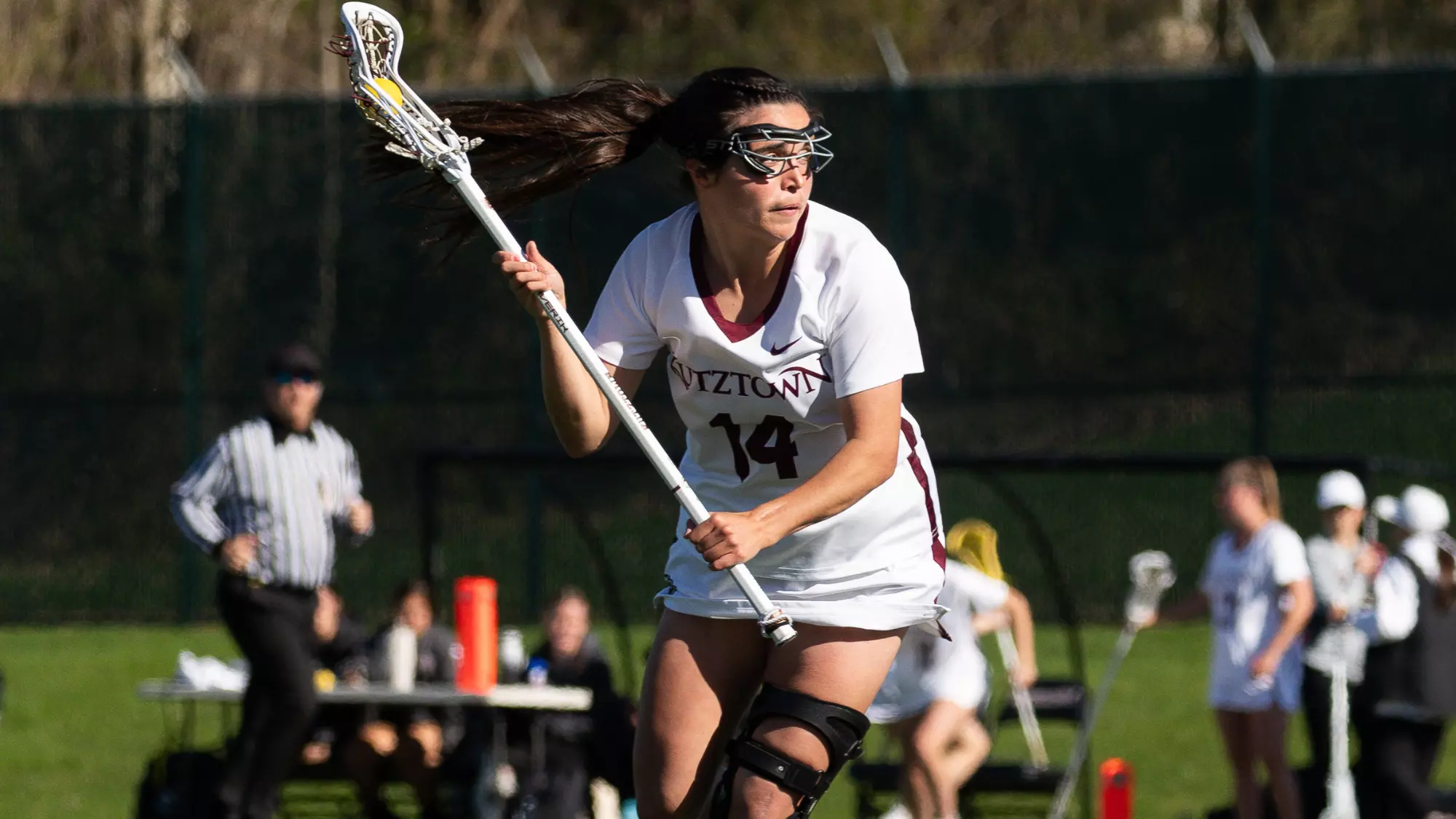 Katie Youcm looks to pass the ball at home vs. No. 11 West Chester 2026