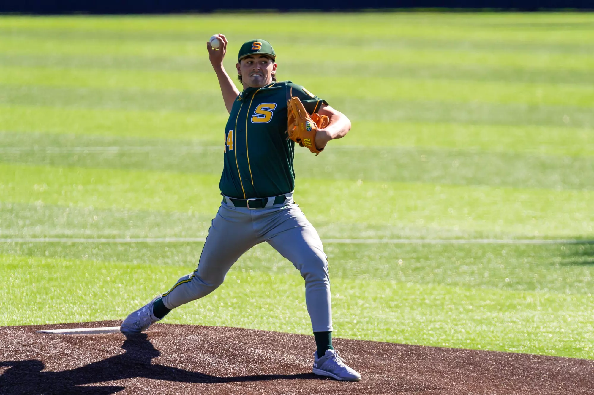 Lakin Polk delivers a pitch to the plate.